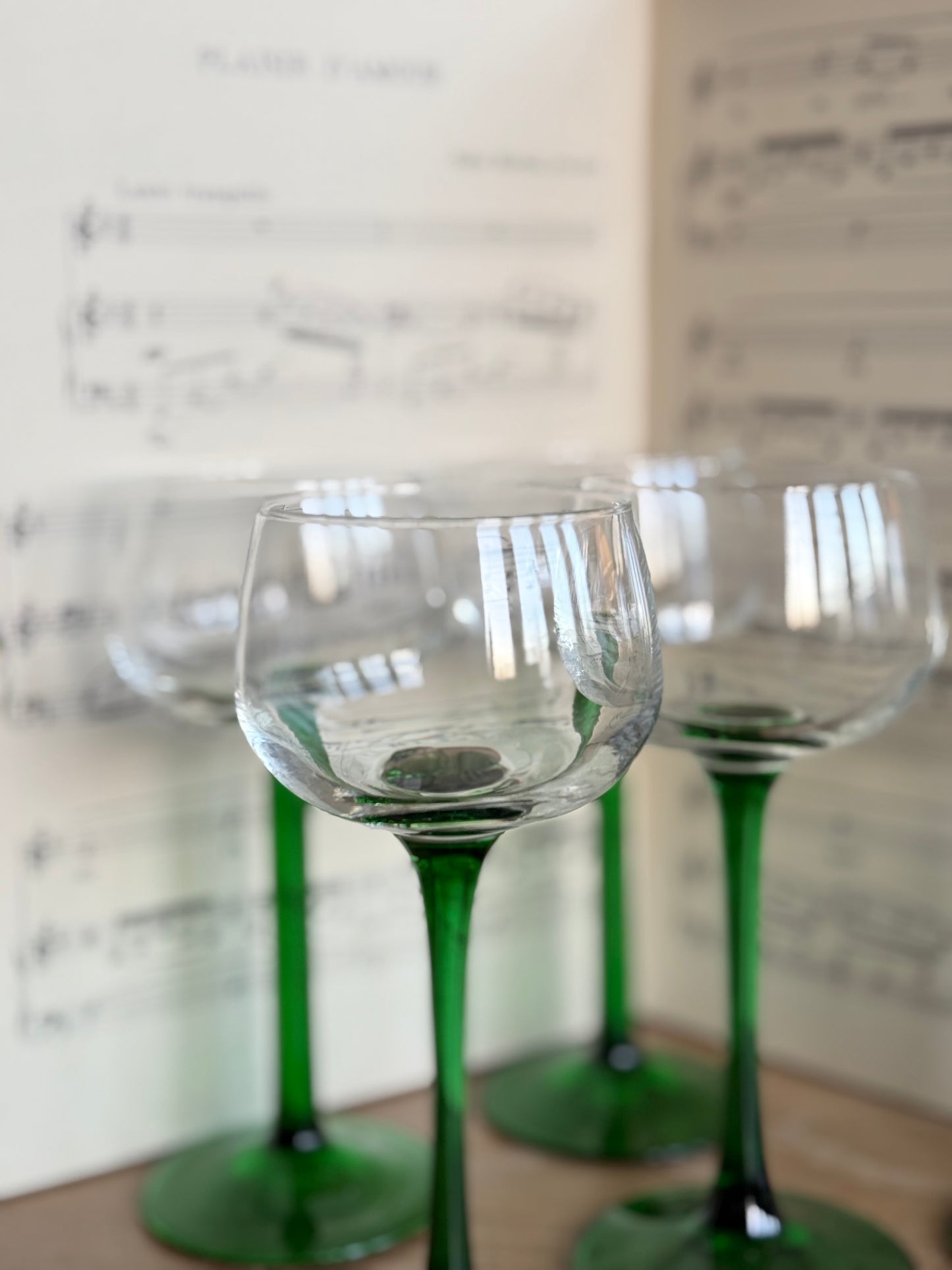 Vintage French green stemmed wine glasses.