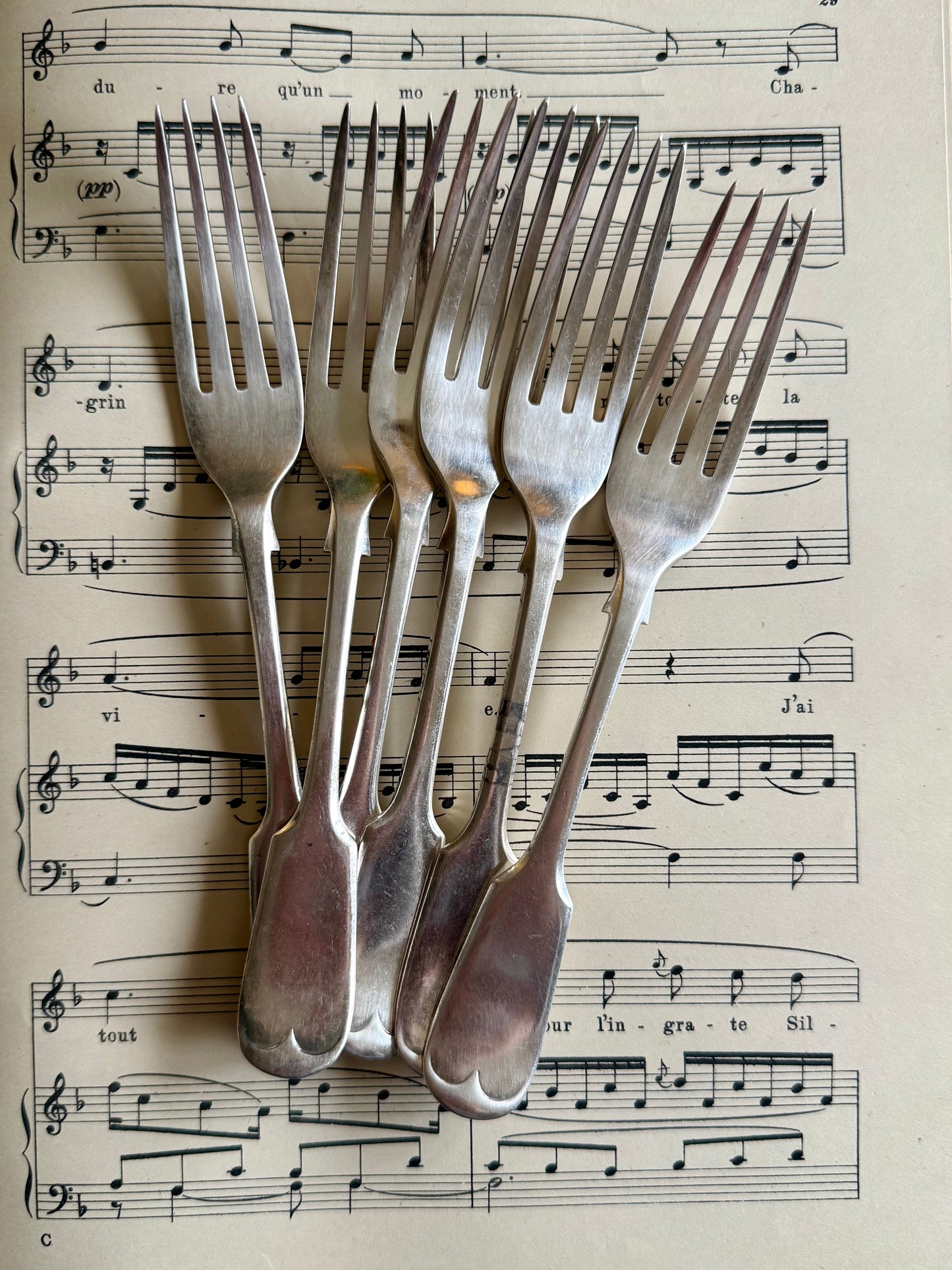 Antique silver plated cake forks.