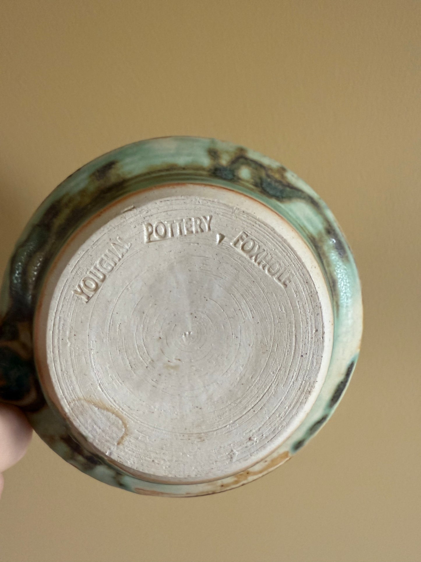 Vintage, handmade pottery candlestick holder.