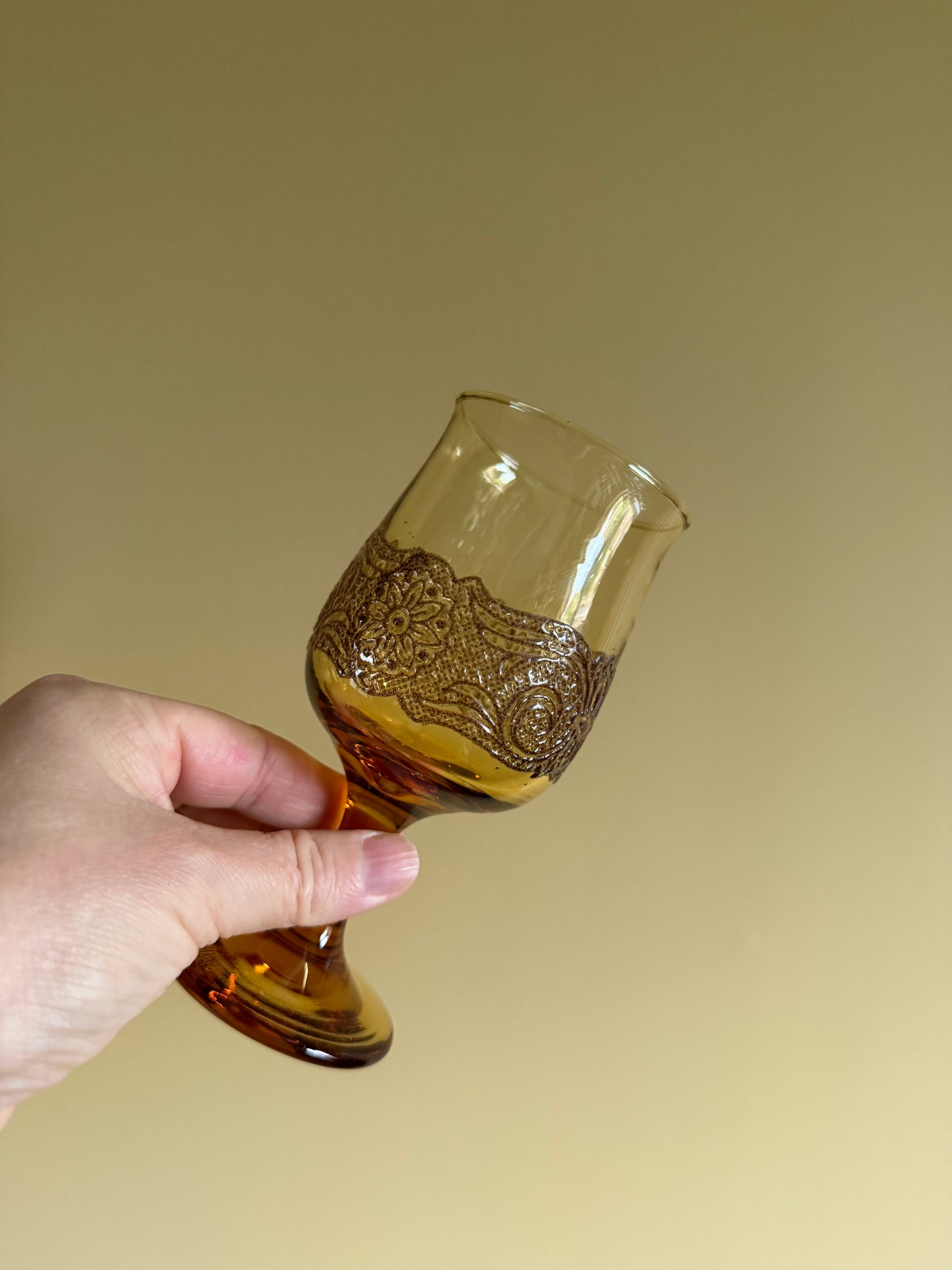 Vintage, amber, lace stemmed glasses.
