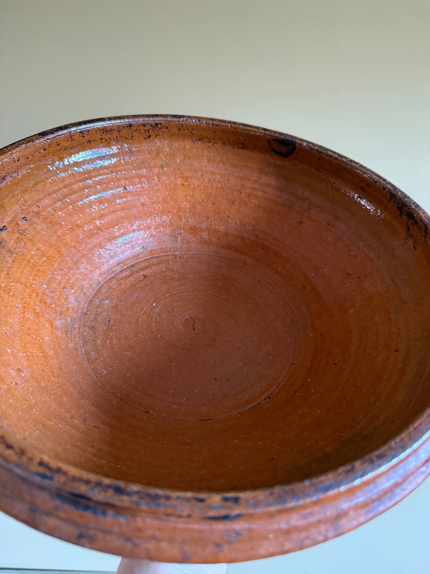 Antique, rustic terracotta dish.
