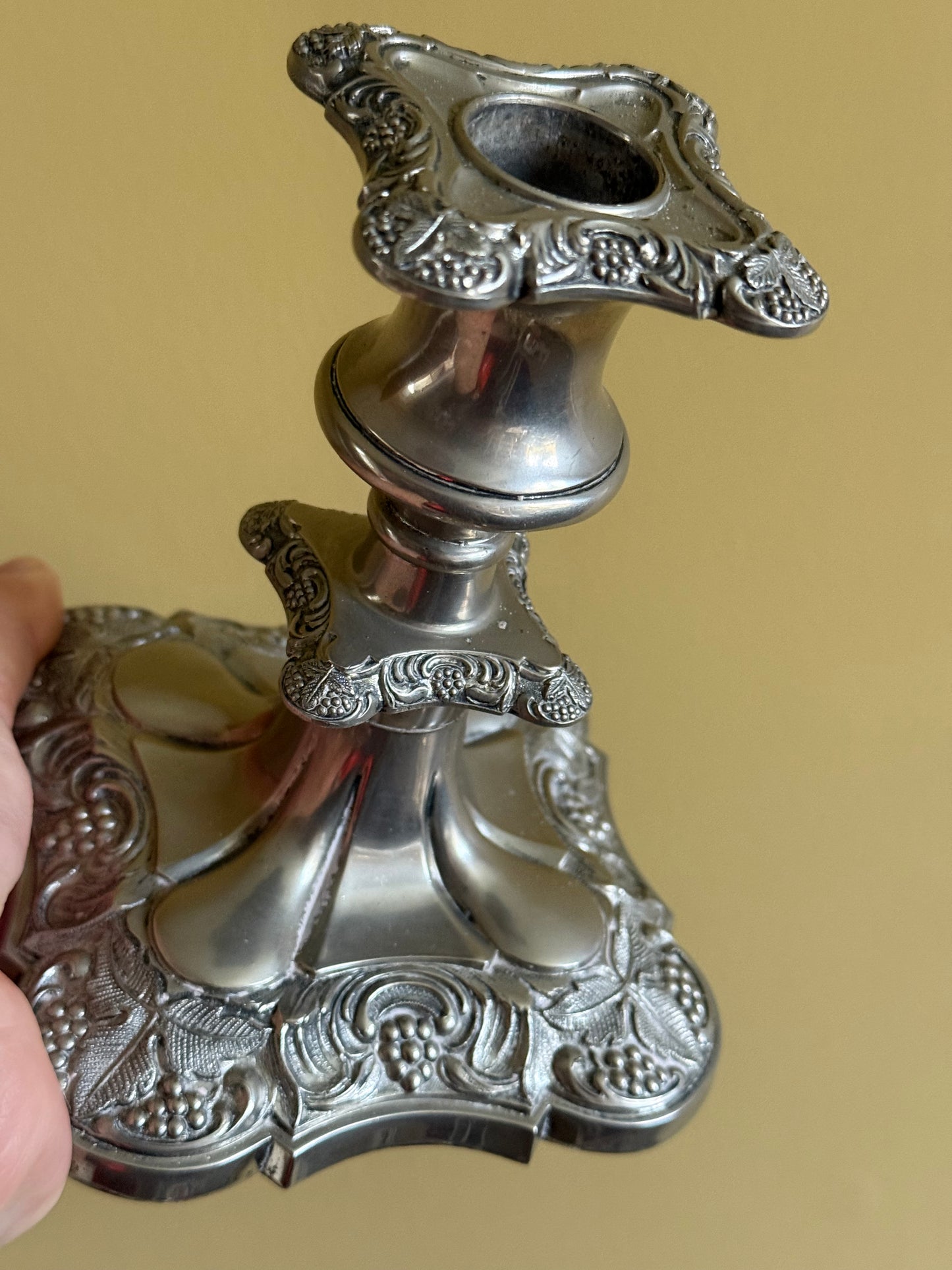 Antique, silver plated candlestick holders.