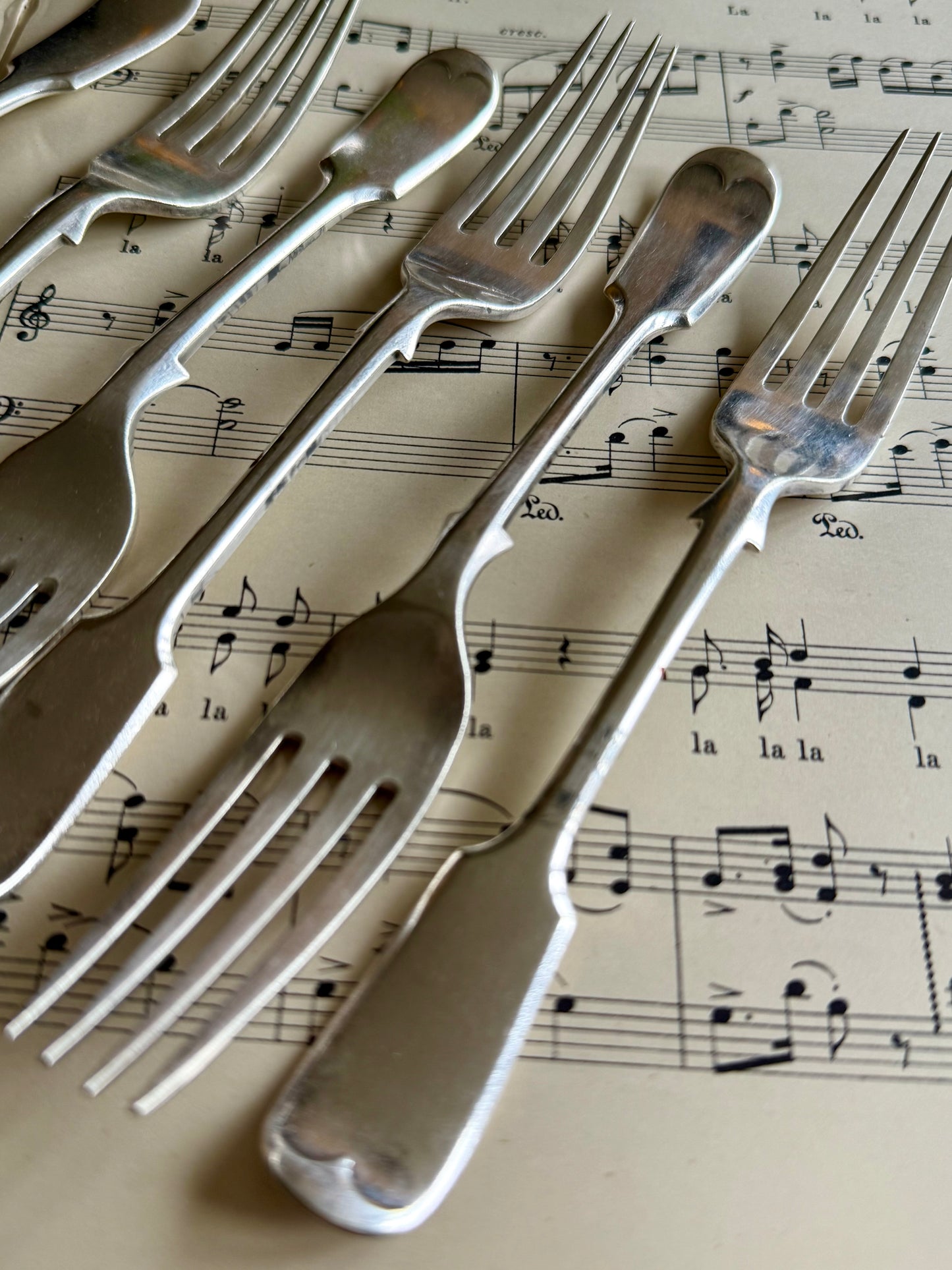 Antique silver plated cake forks.