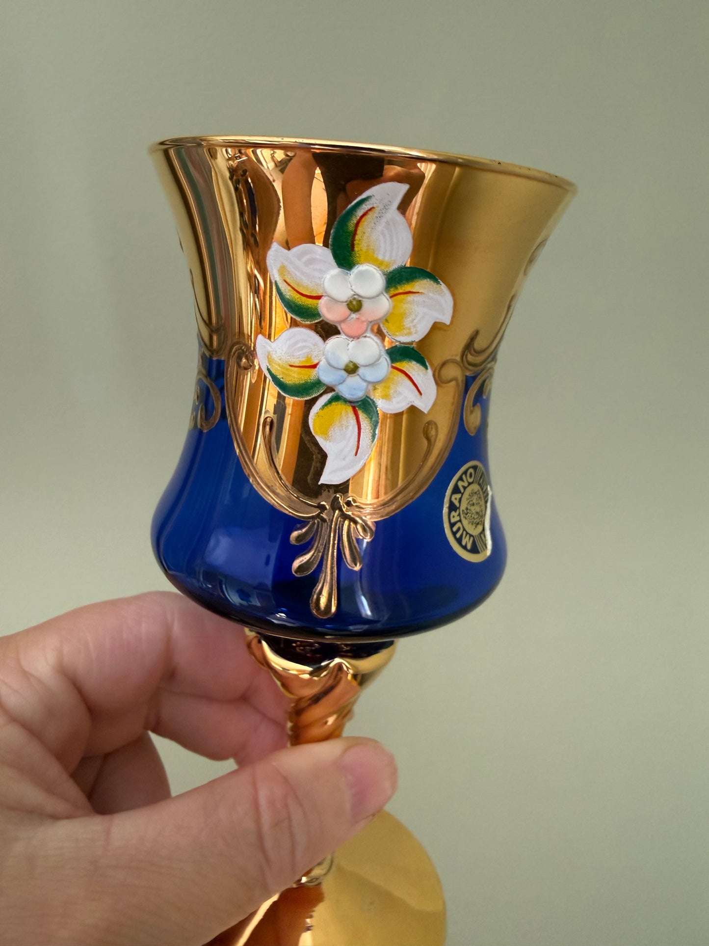 Set of 4 Murano cobalt blue and gold Venetian glass goblets with enamel floral decoration.
