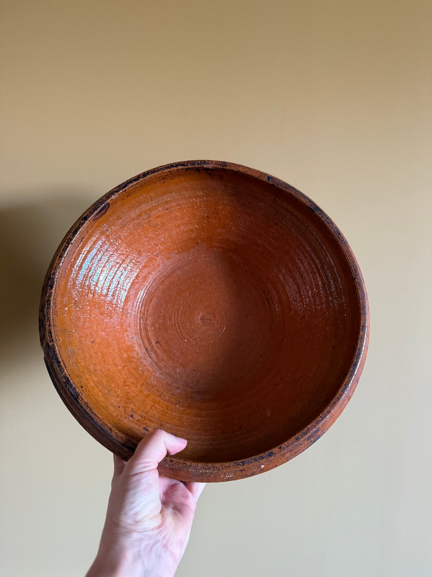 Antique, rustic terracotta dish.