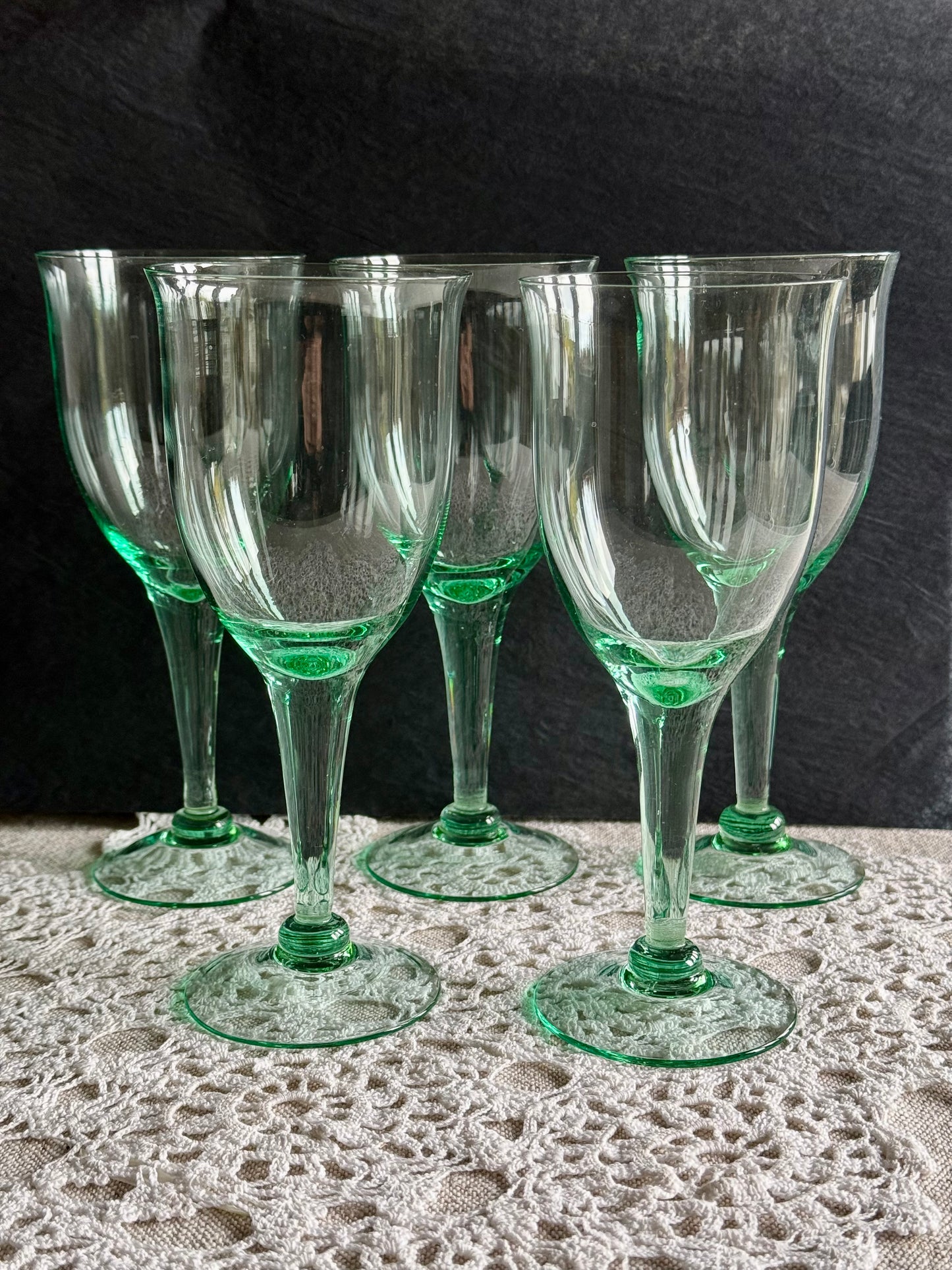 Vintage green stemmed glasses.
