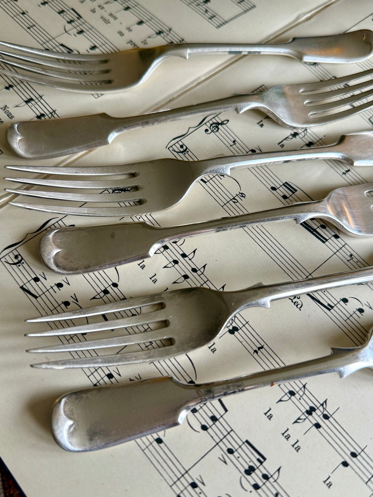 Antique silver plated cake forks.