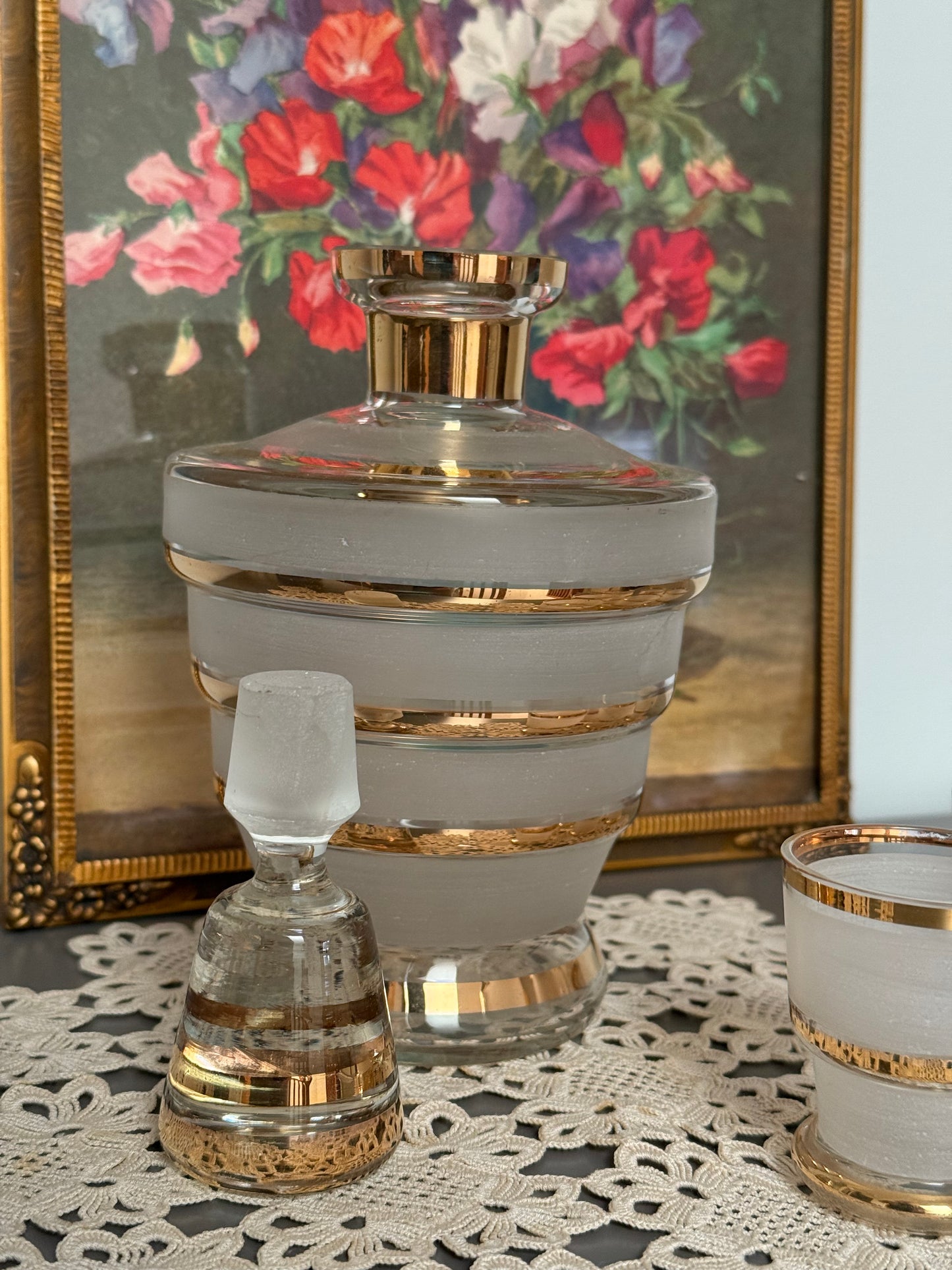 Vintage, liquor frosted glass with gold bands decanter and 6 shot glasses.