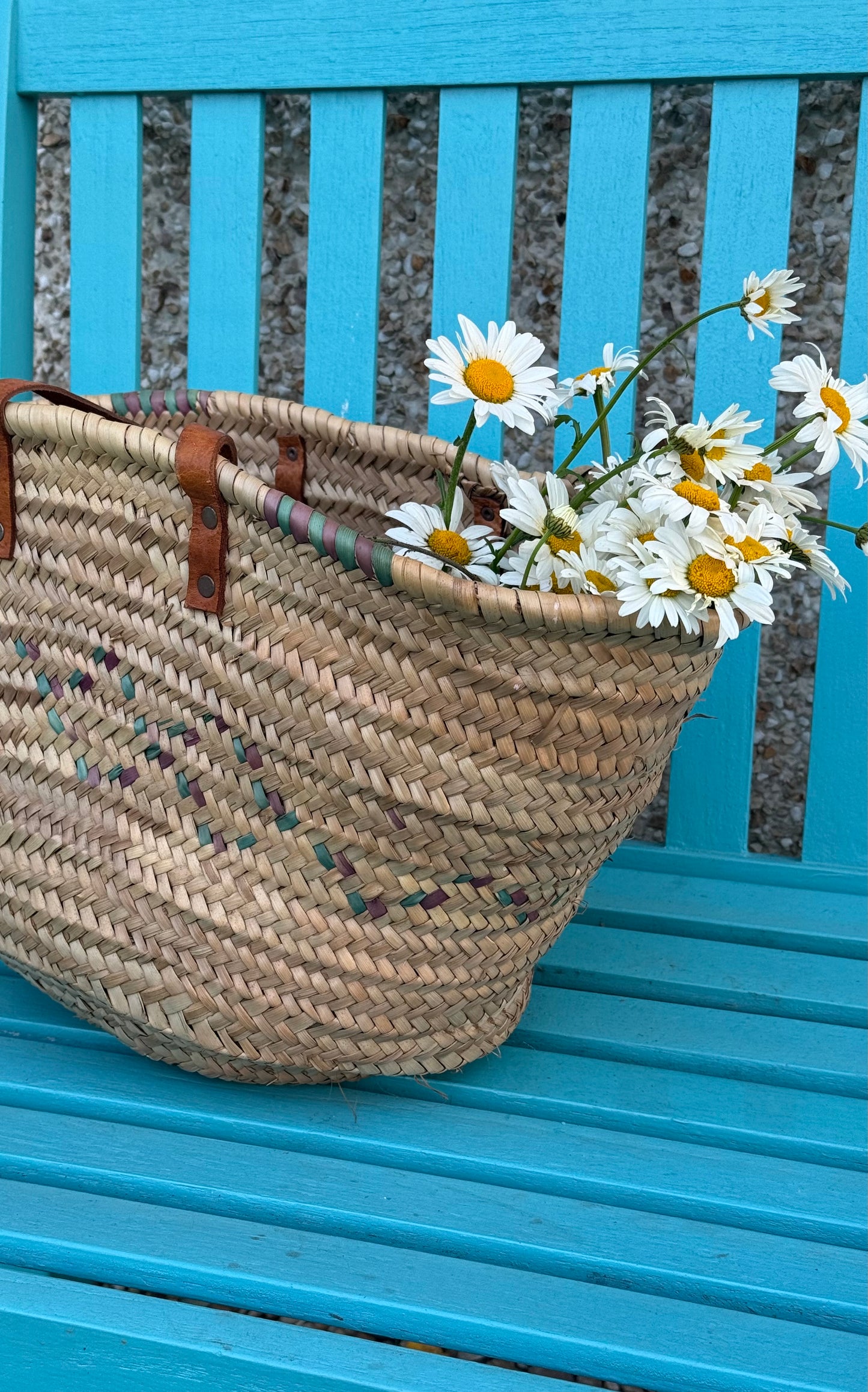 Vintage, genuine leather handles straw basket.