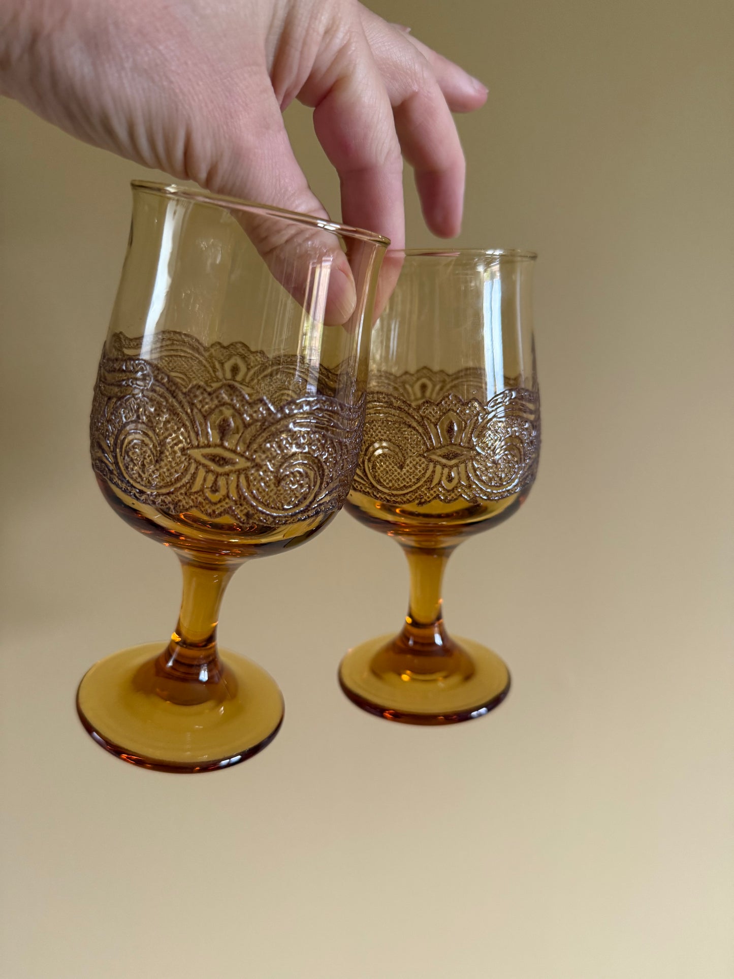 Vintage, amber, lace stemmed glasses.