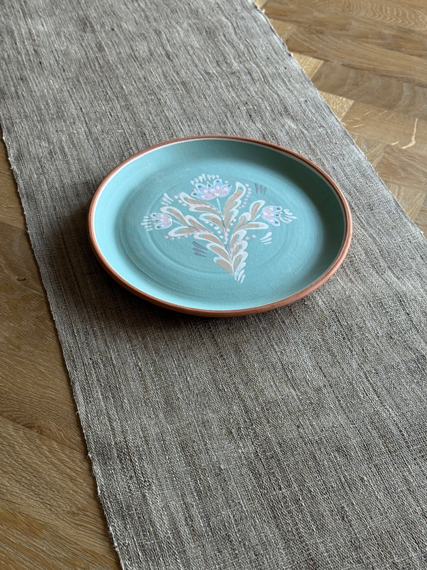 Handmade, unglazed platter.