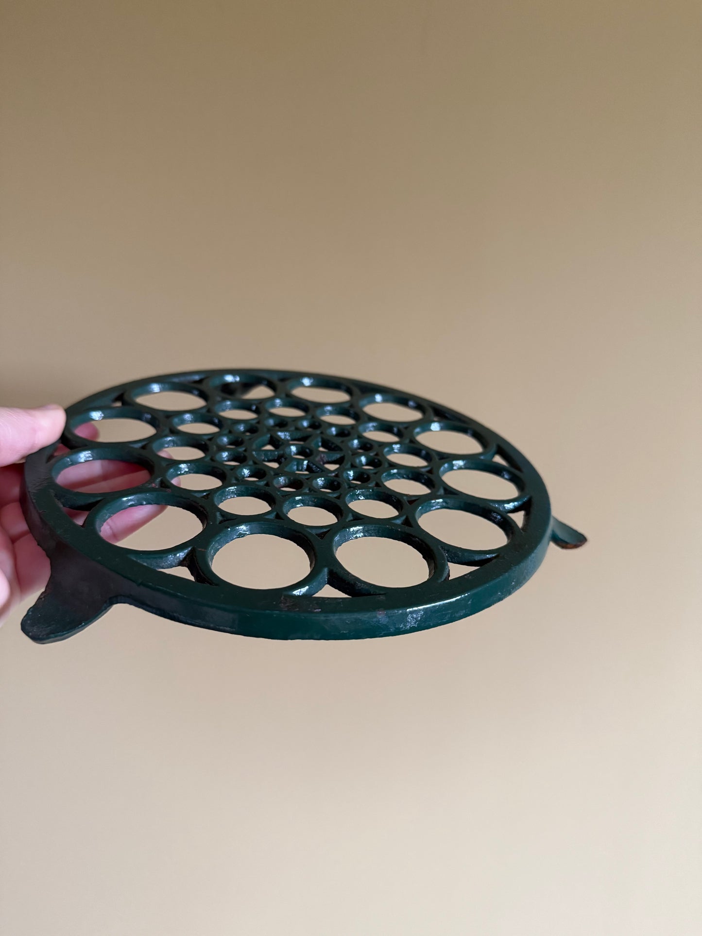 Cast iron trivet.