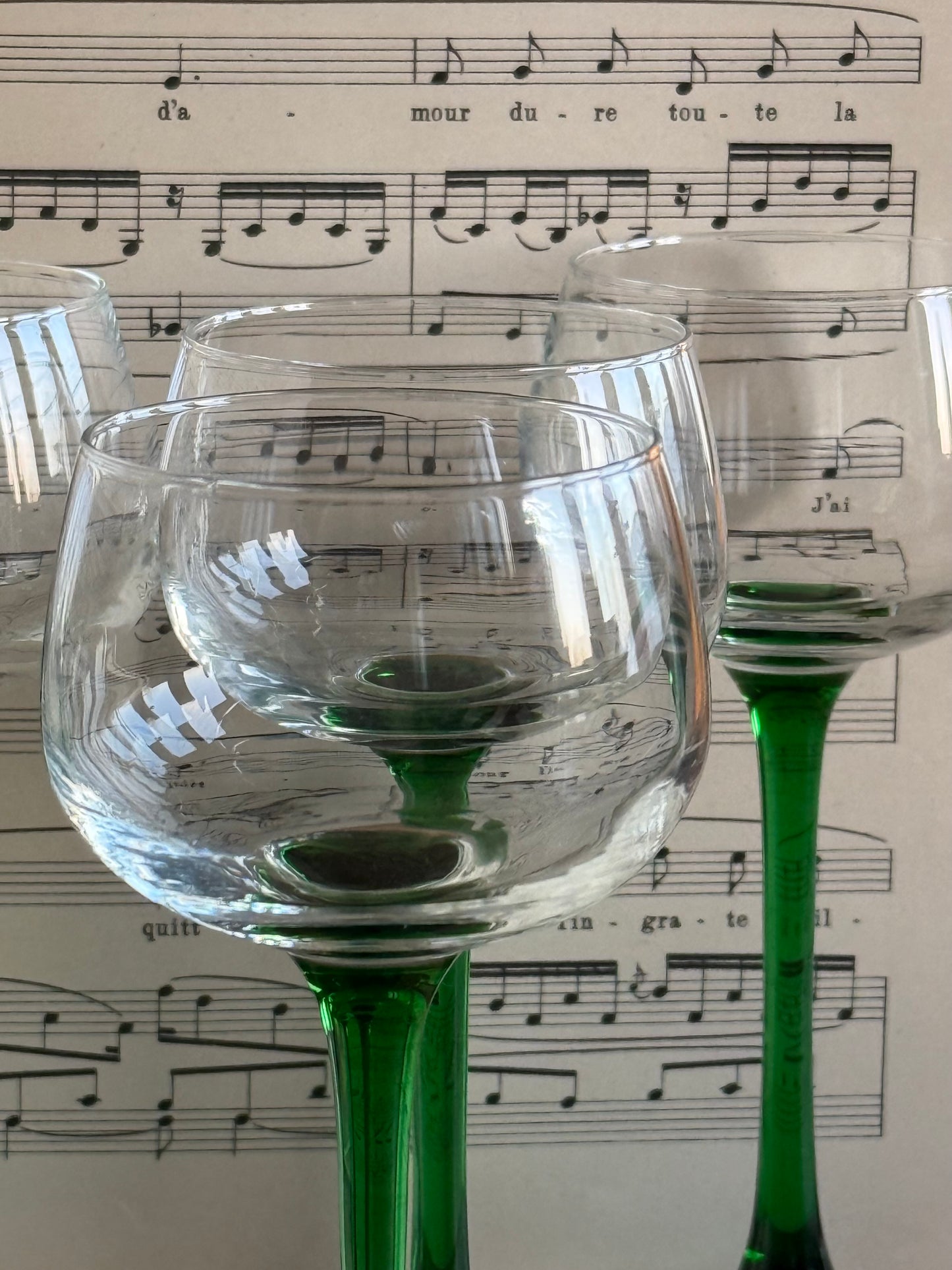 Vintage French green stemmed wine glasses.