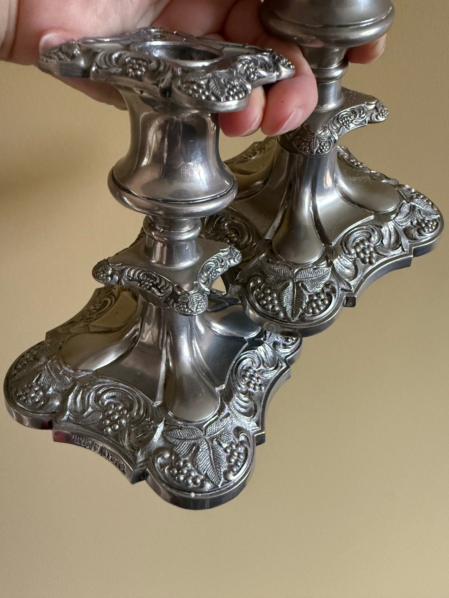 Antique, silver plated candlestick holders.