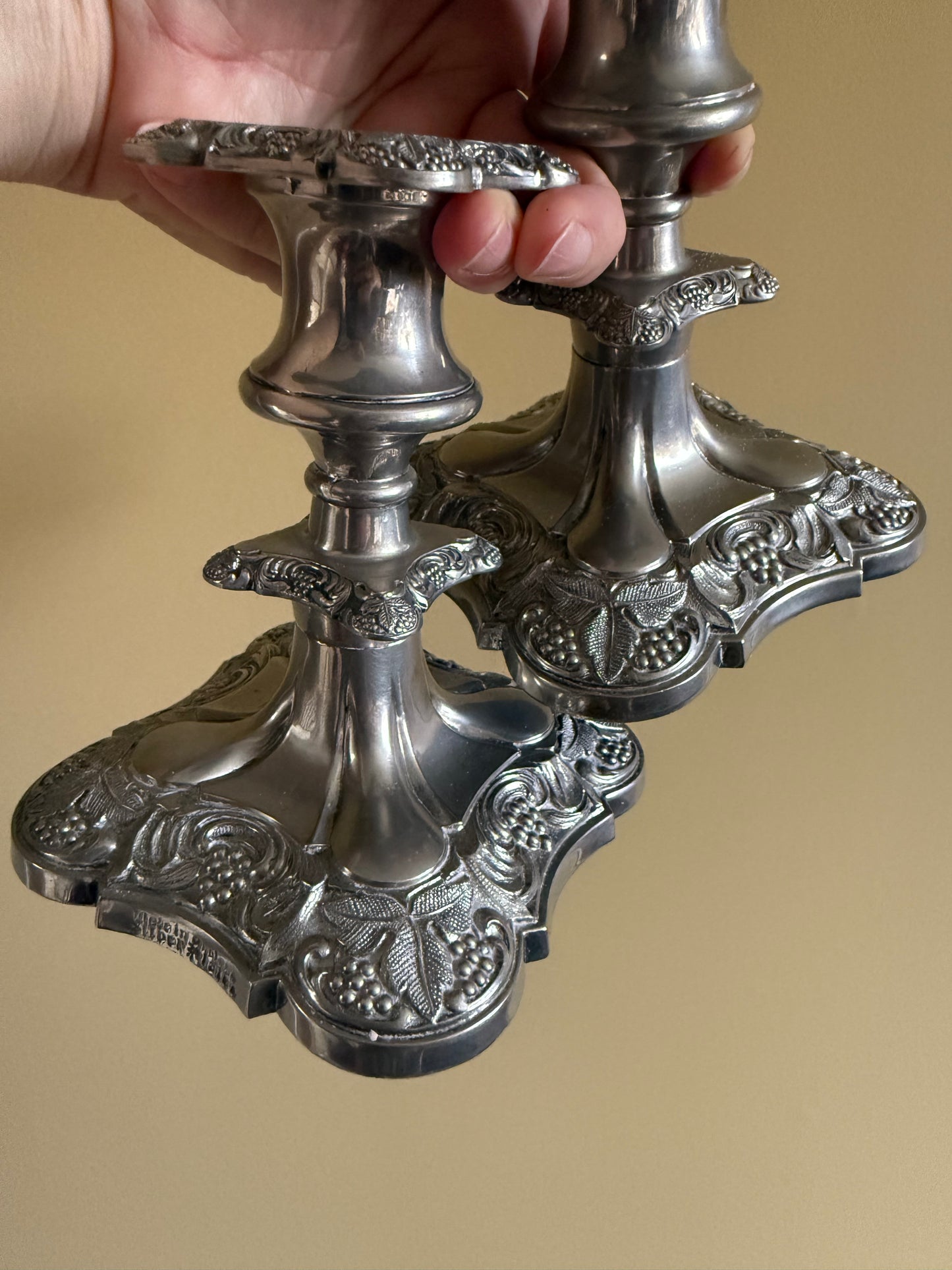 Antique, silver plated candlestick holders.