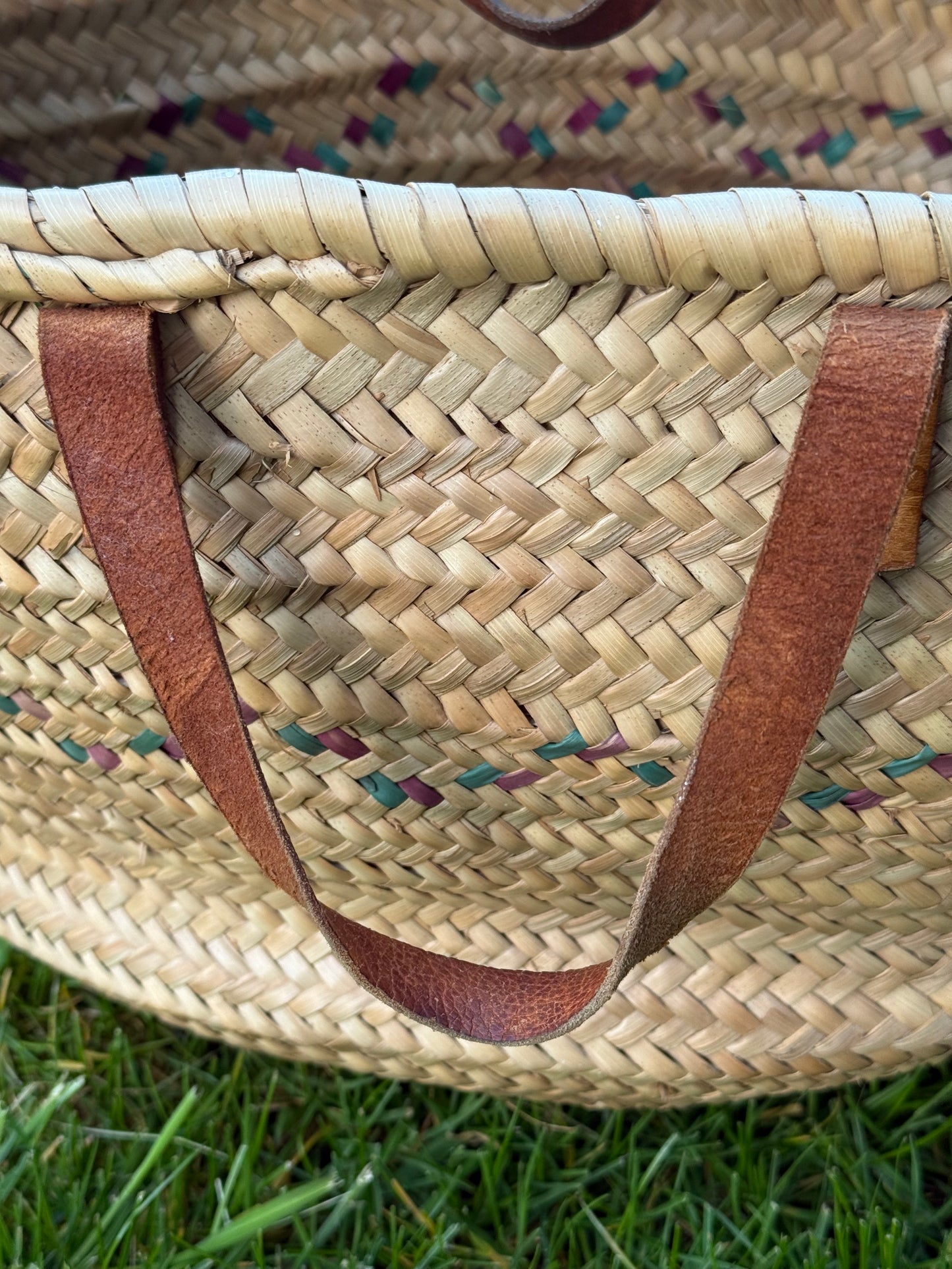 Vintage, genuine leather handles straw basket.