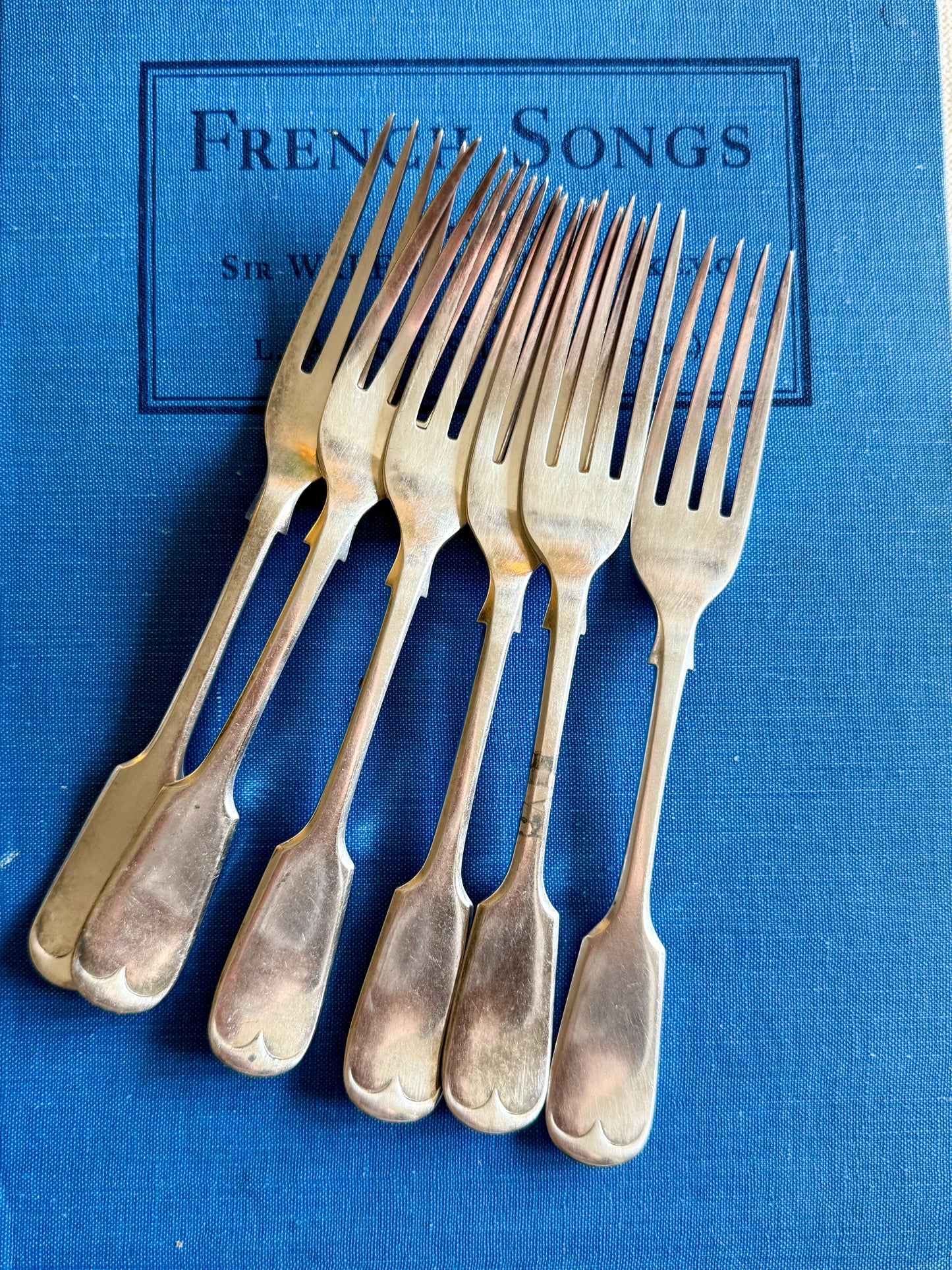 Antique silver plated cake forks.