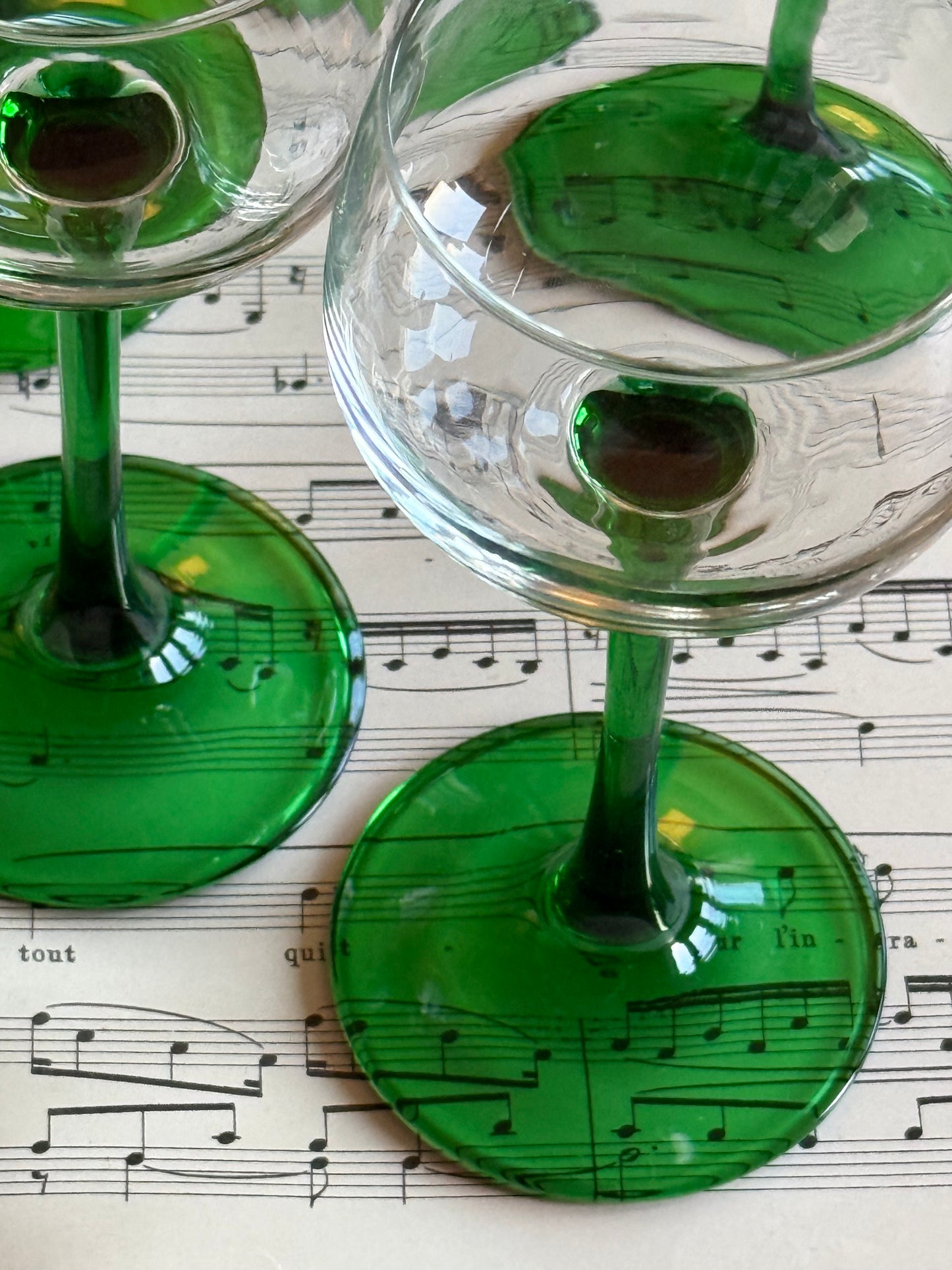 Vintage French green stemmed wine glasses.