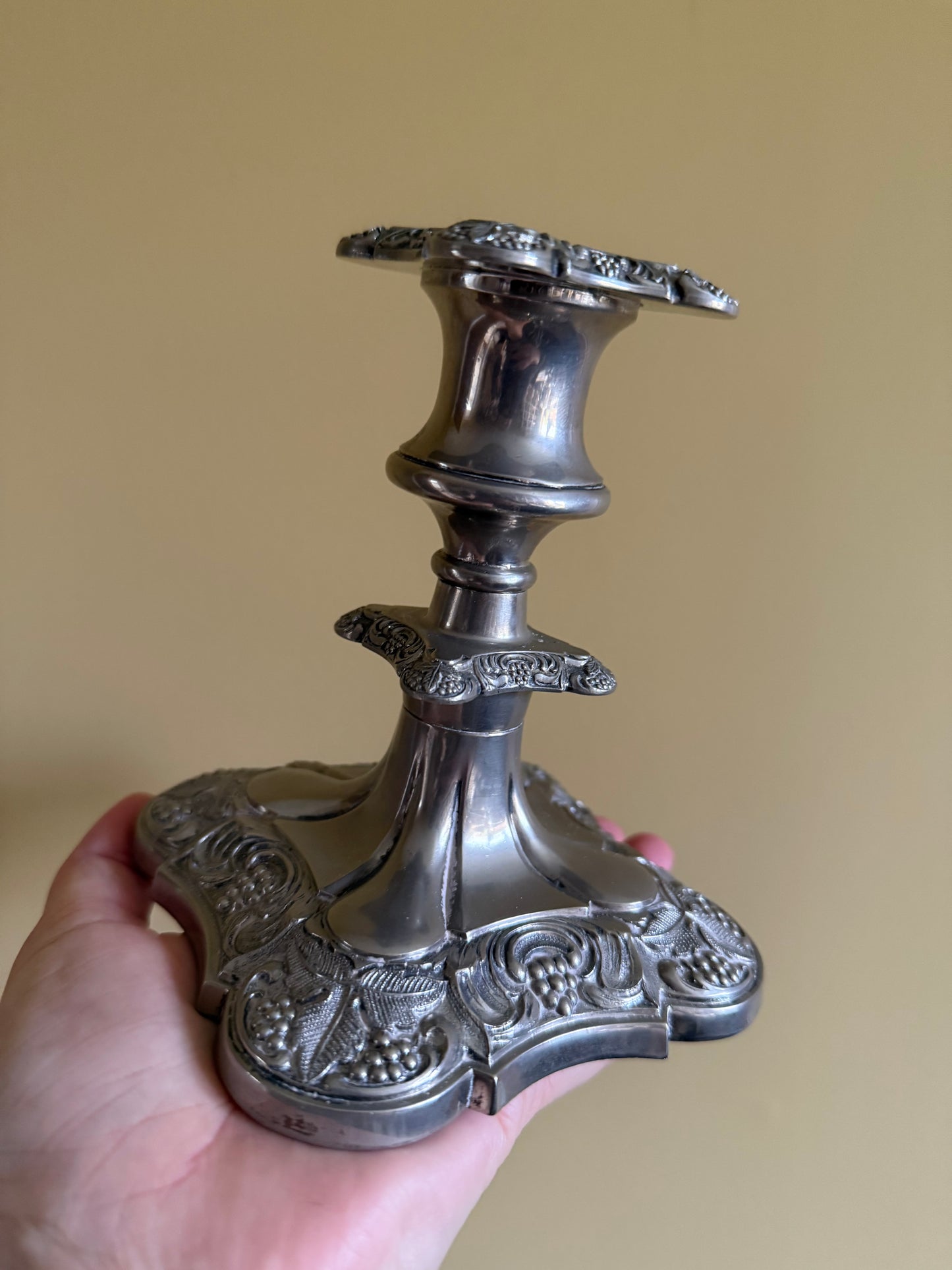 Antique, silver plated candlestick holders.
