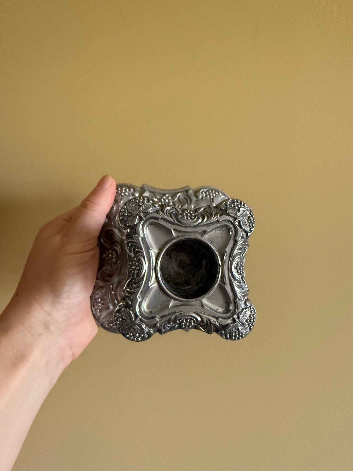 Antique, silver plated candlestick holders.