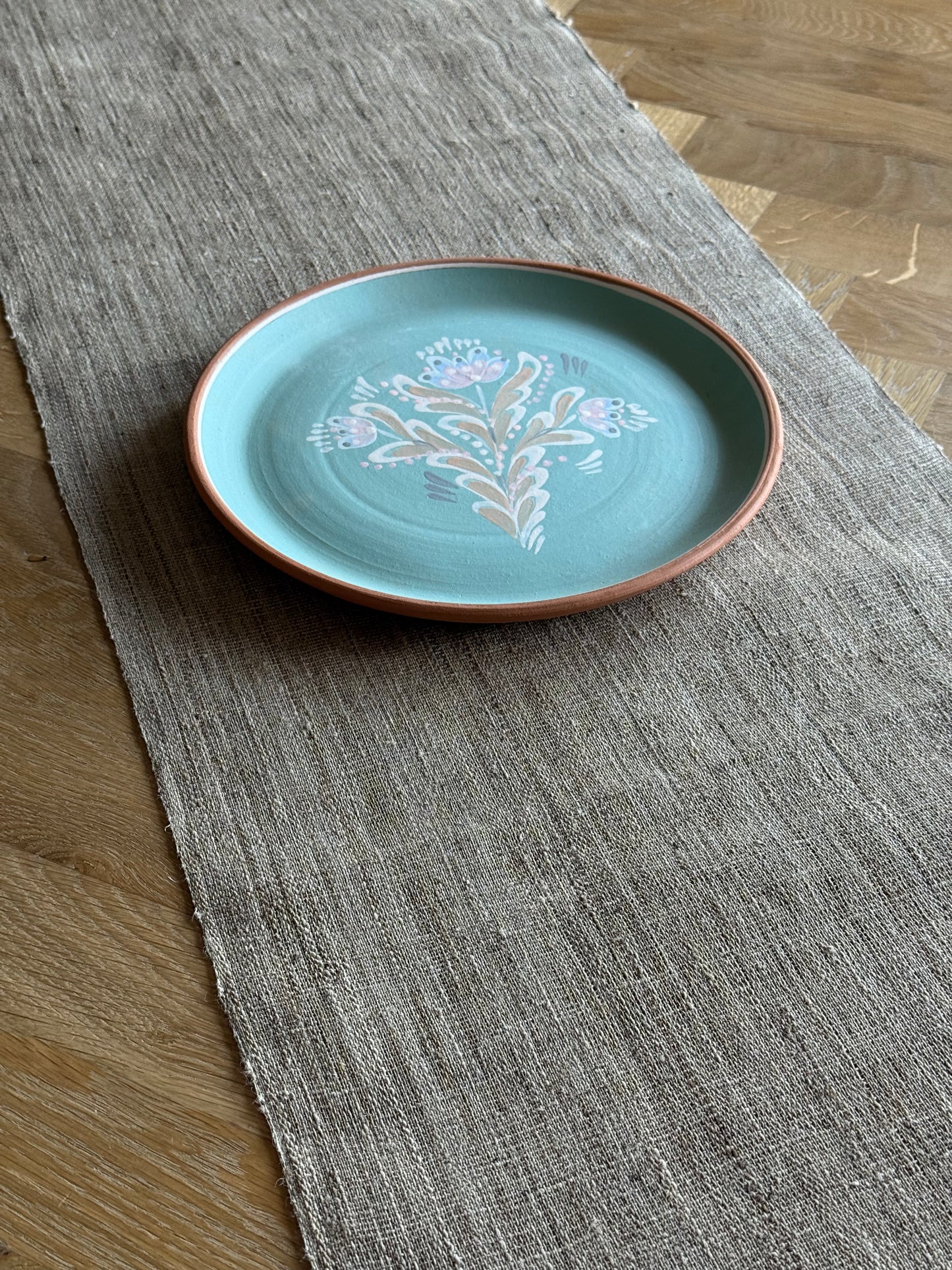 Handmade, unglazed platter.