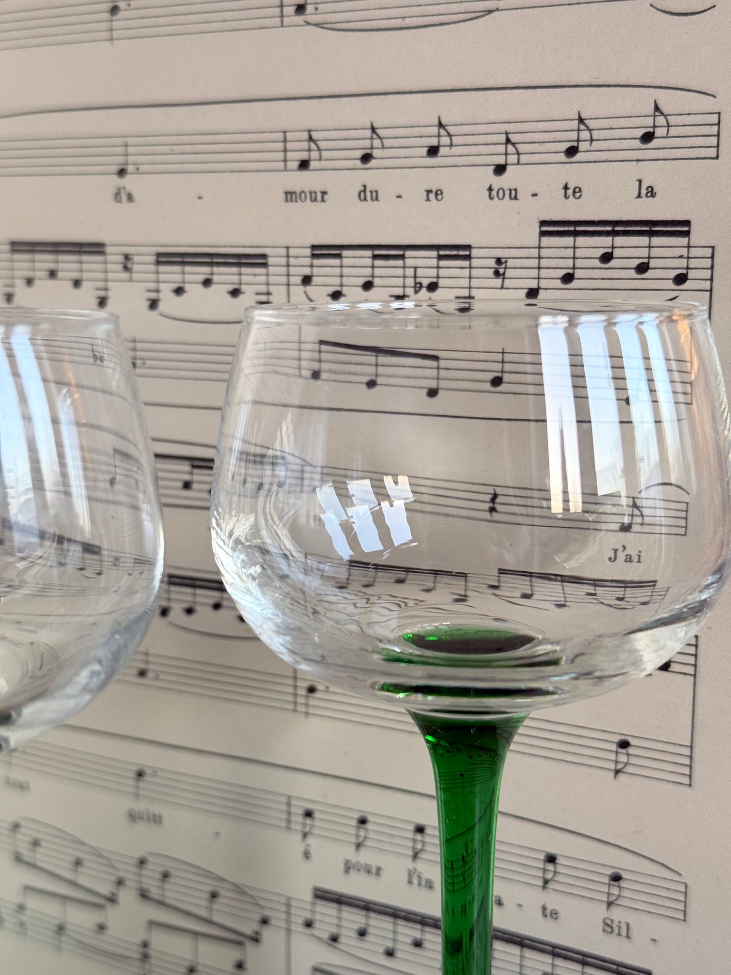 Vintage French green stemmed wine glasses.