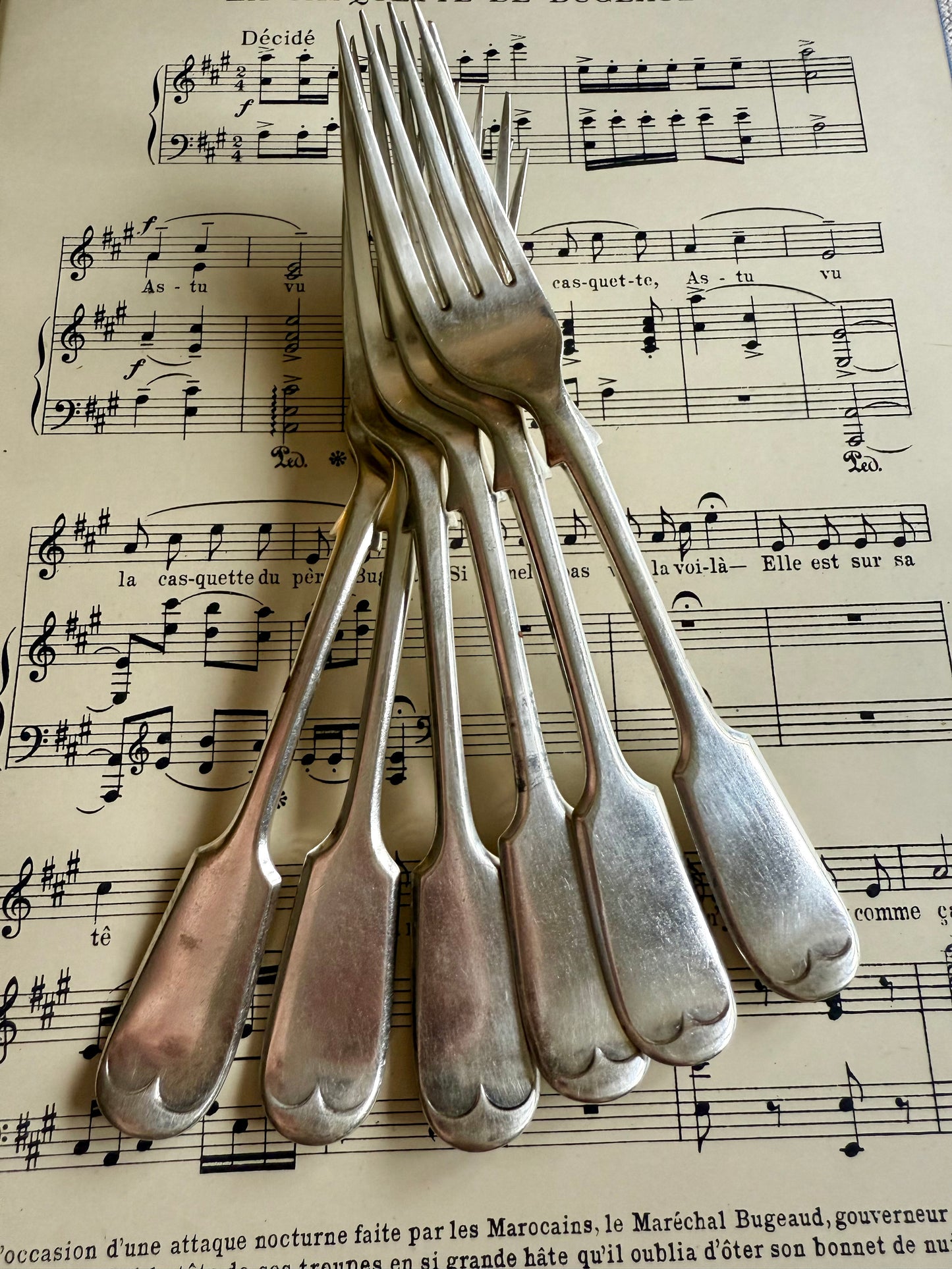 Antique silver plated cake forks.