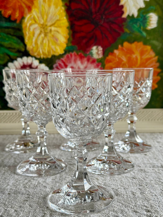 Vintage crystal sherry glasses.