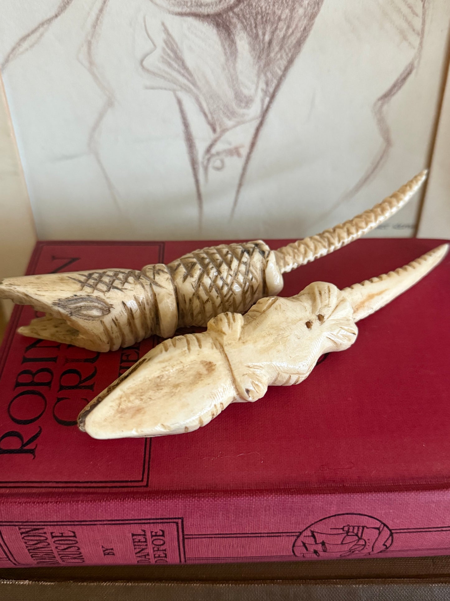 Vintage hand carved bone crocodile sculptures.