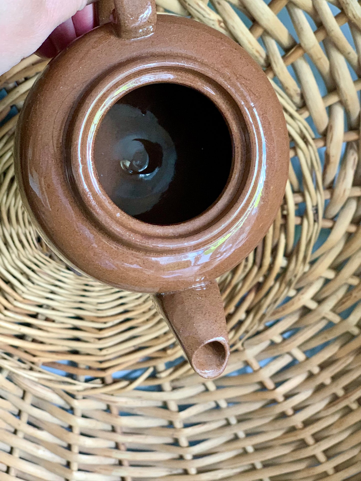 Single, vintage, handmade terracotta teapot.