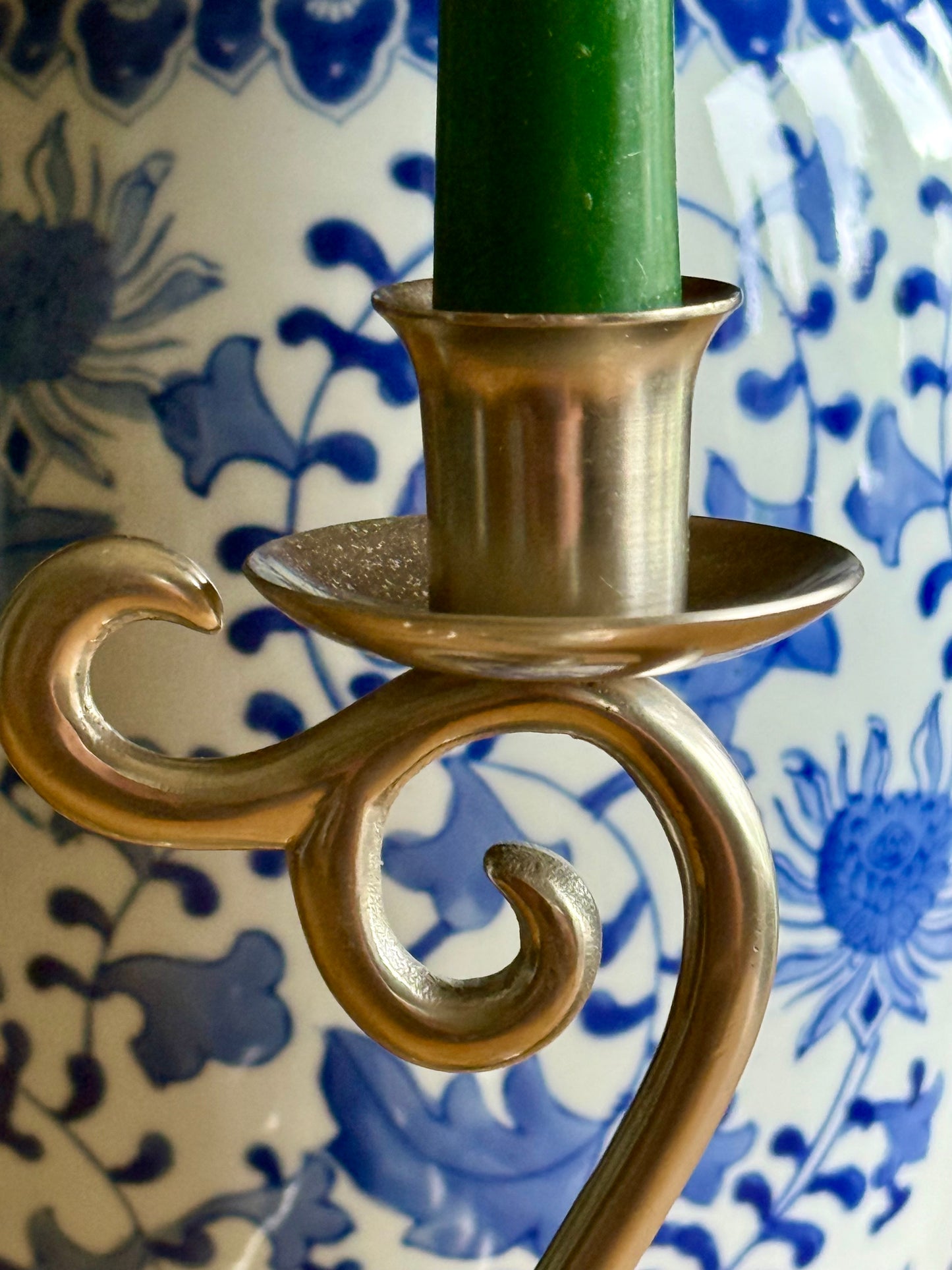 Vintage elegant white metal candlestick holders.