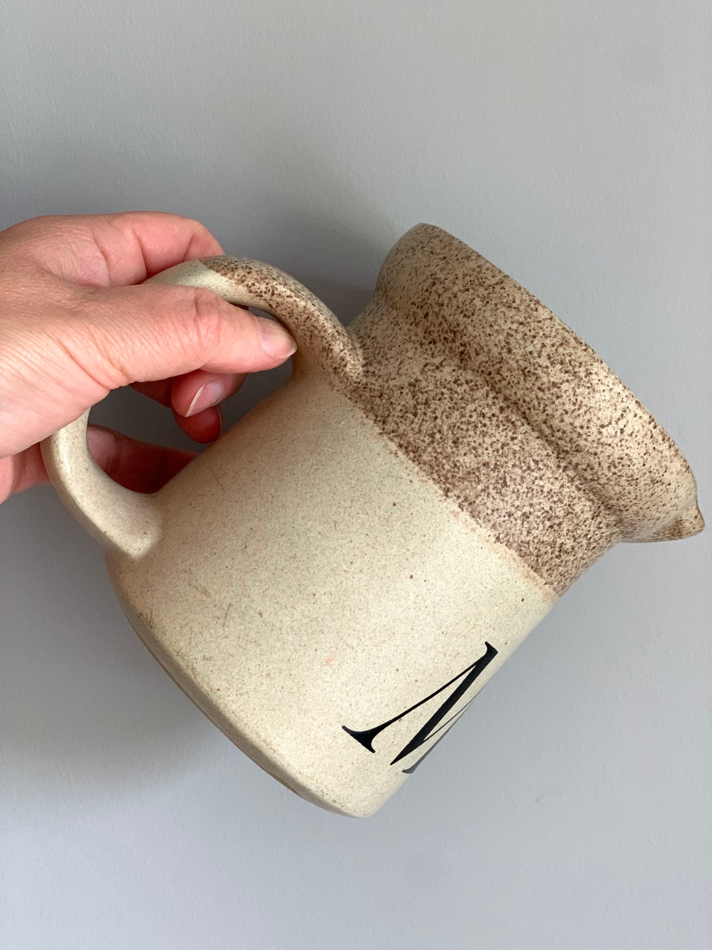 Vintage, handmade, terracotta milk jug.