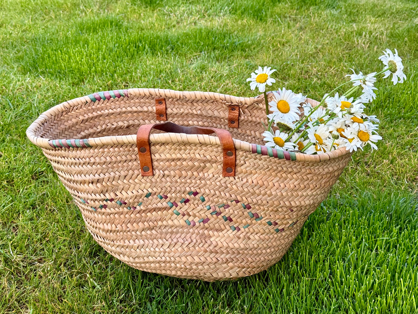 Vintage, genuine leather handles straw basket.