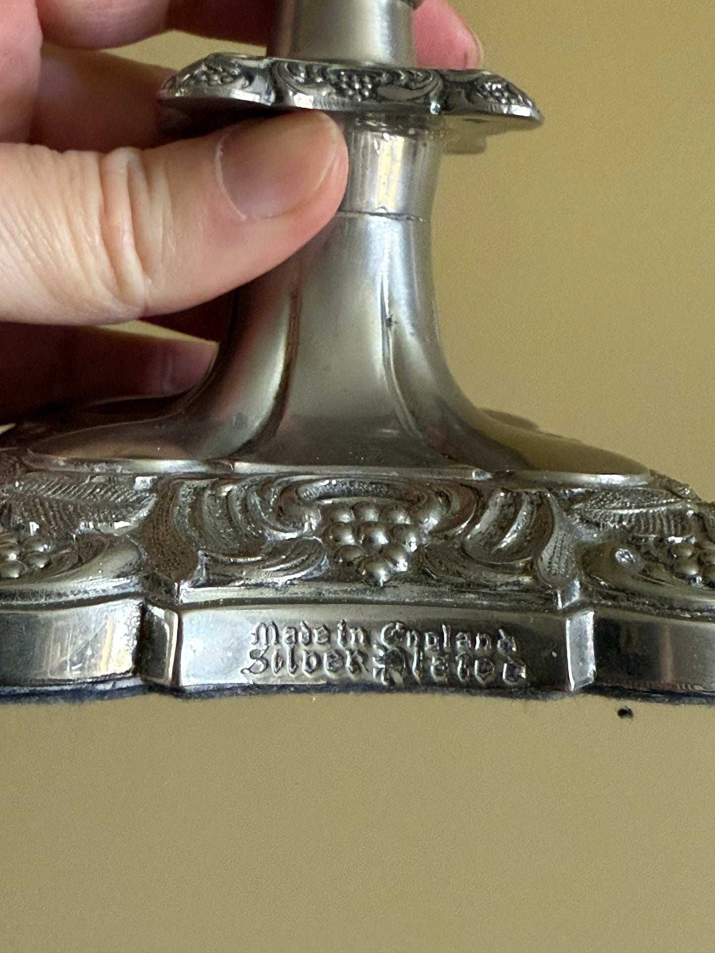 Antique, silver plated candlestick holders.