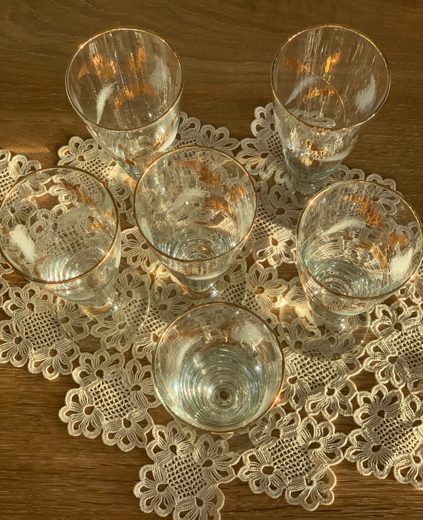 Vintage, gold feather stemmed glasses.