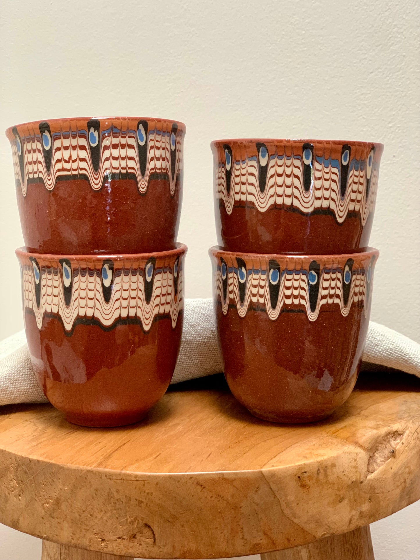 Hand thrown and hand painted, ceramic cups.