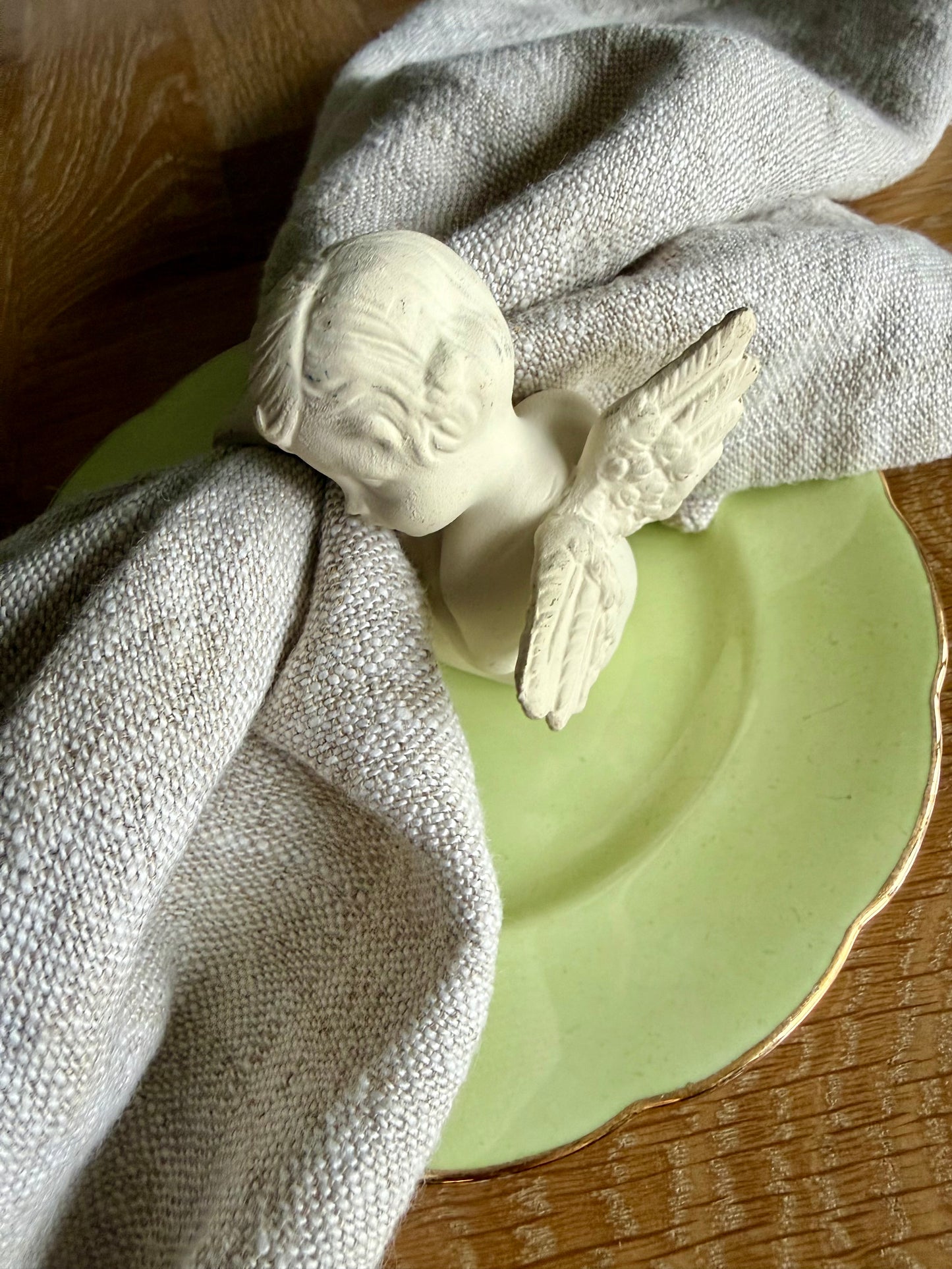 Set of 4 cherub napkin rings.