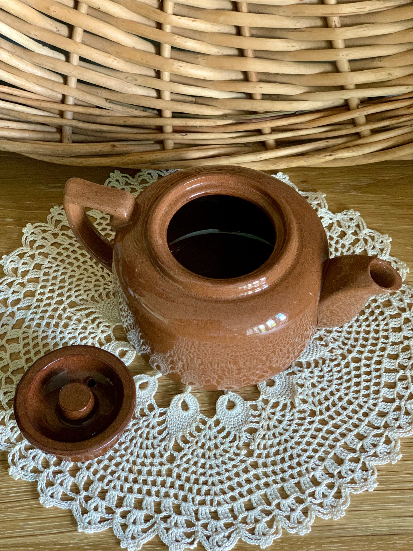 Single, vintage, handmade terracotta teapot.