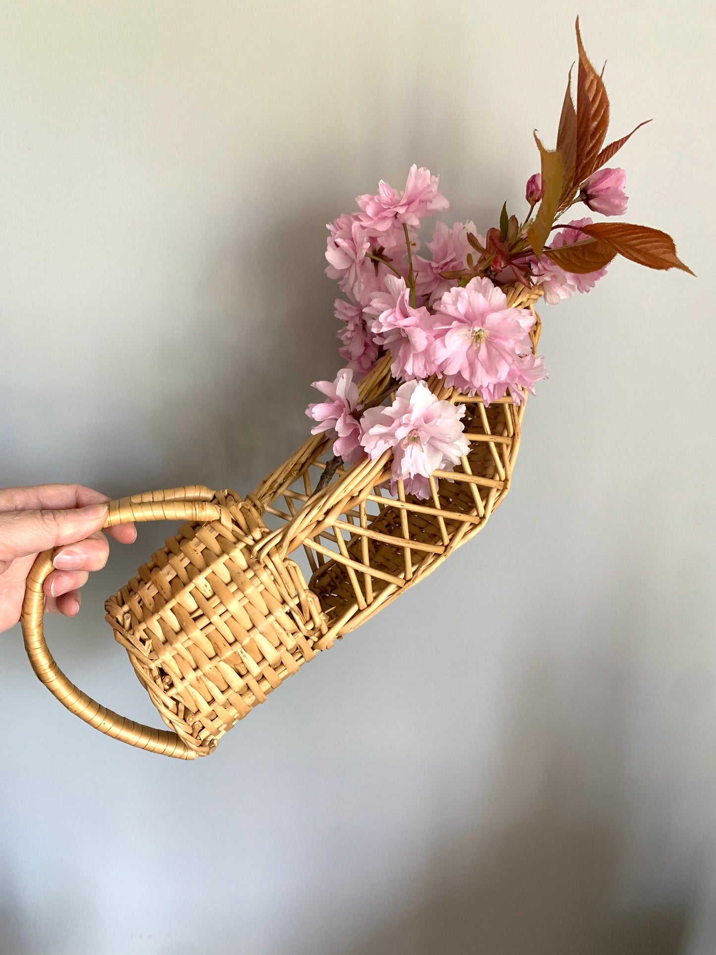 Vintage, hand made wicker wine basket.