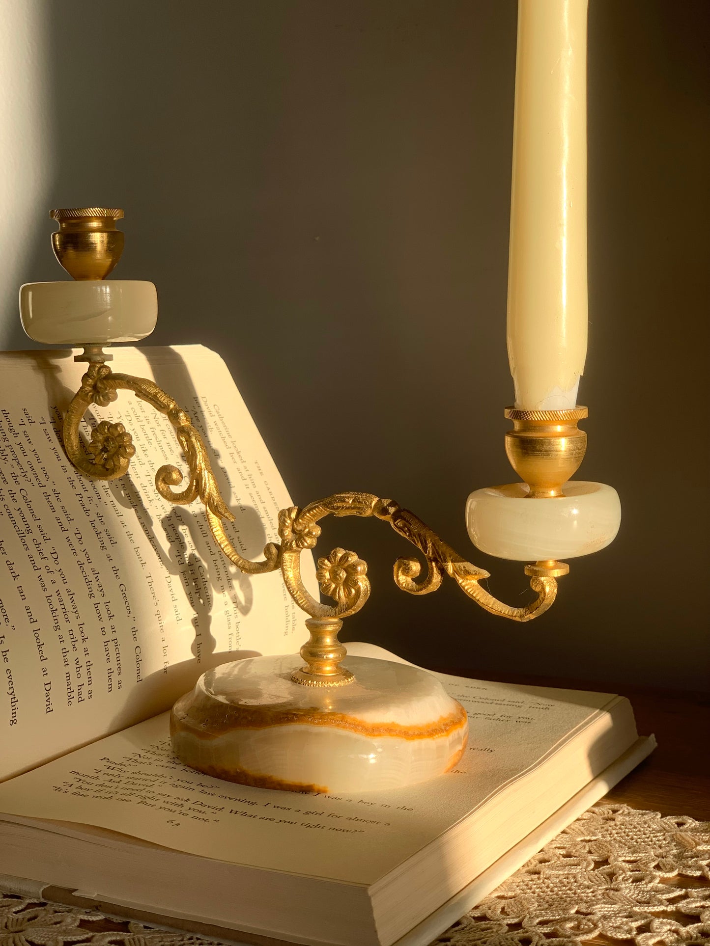 Vintage, onyx and brass candle stick holder.