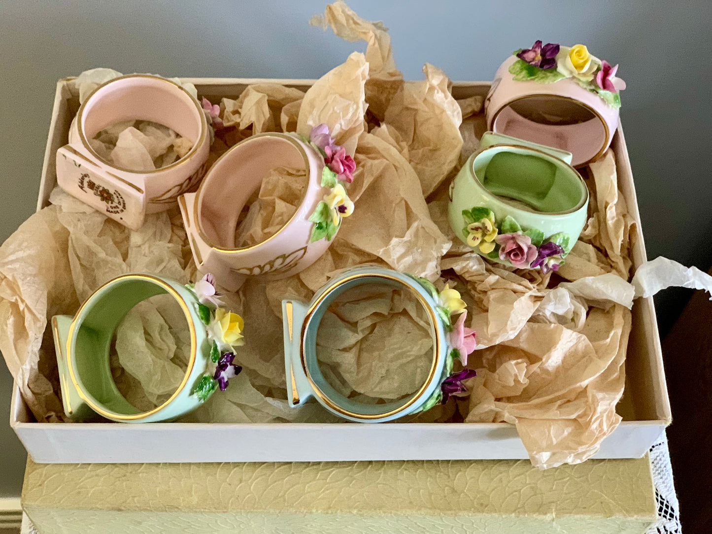 Antique, last century fine bone china, floral napkin rings.