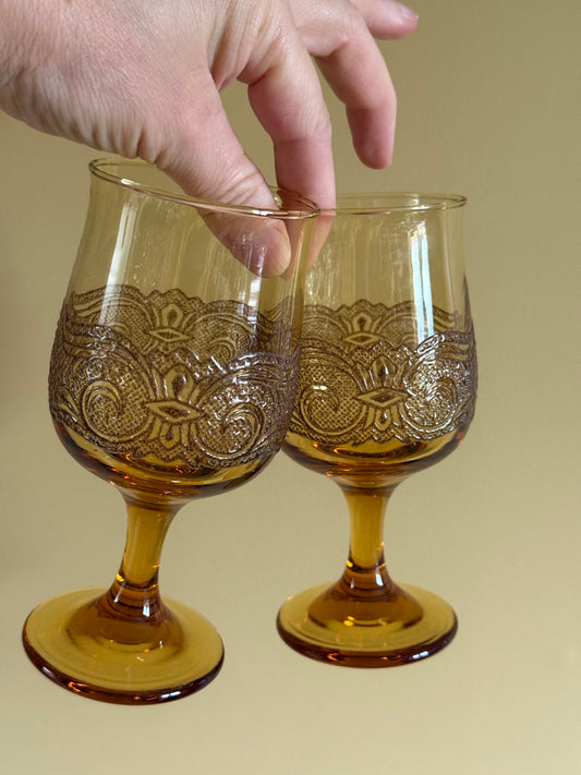 Vintage, amber, lace stemmed glasses.