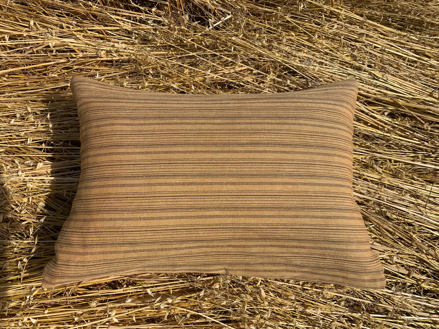 Linen cushion cover.