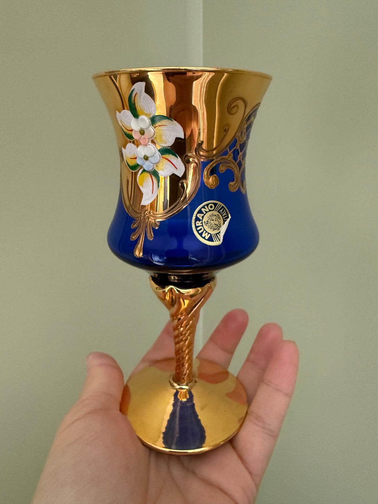 Set of 4 Murano cobalt blue and gold Venetian glass goblets with enamel floral decoration.