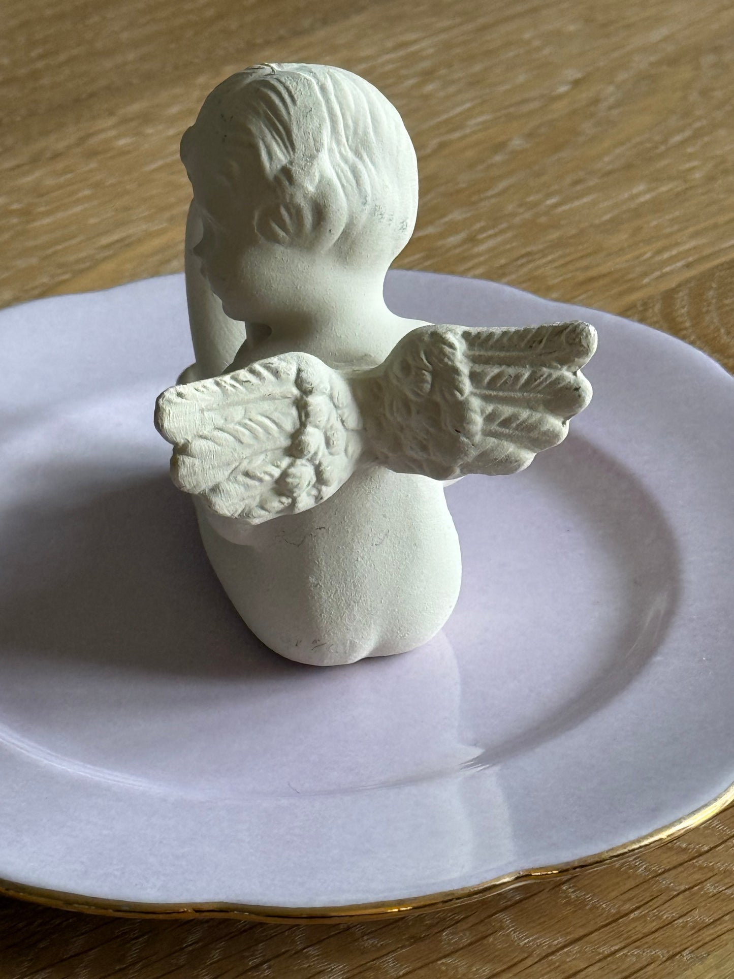 Set of 4 cherub napkin rings.