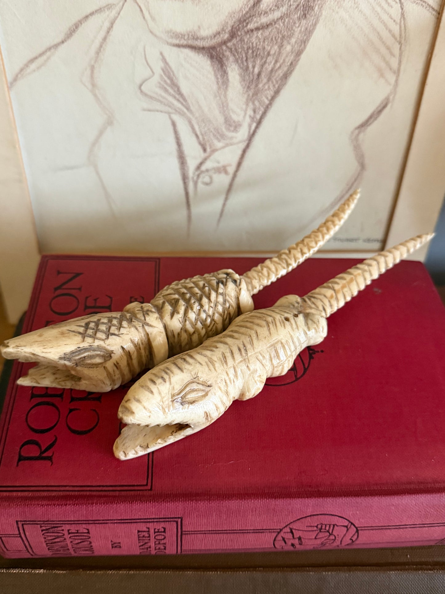 Vintage hand carved bone crocodile sculptures.