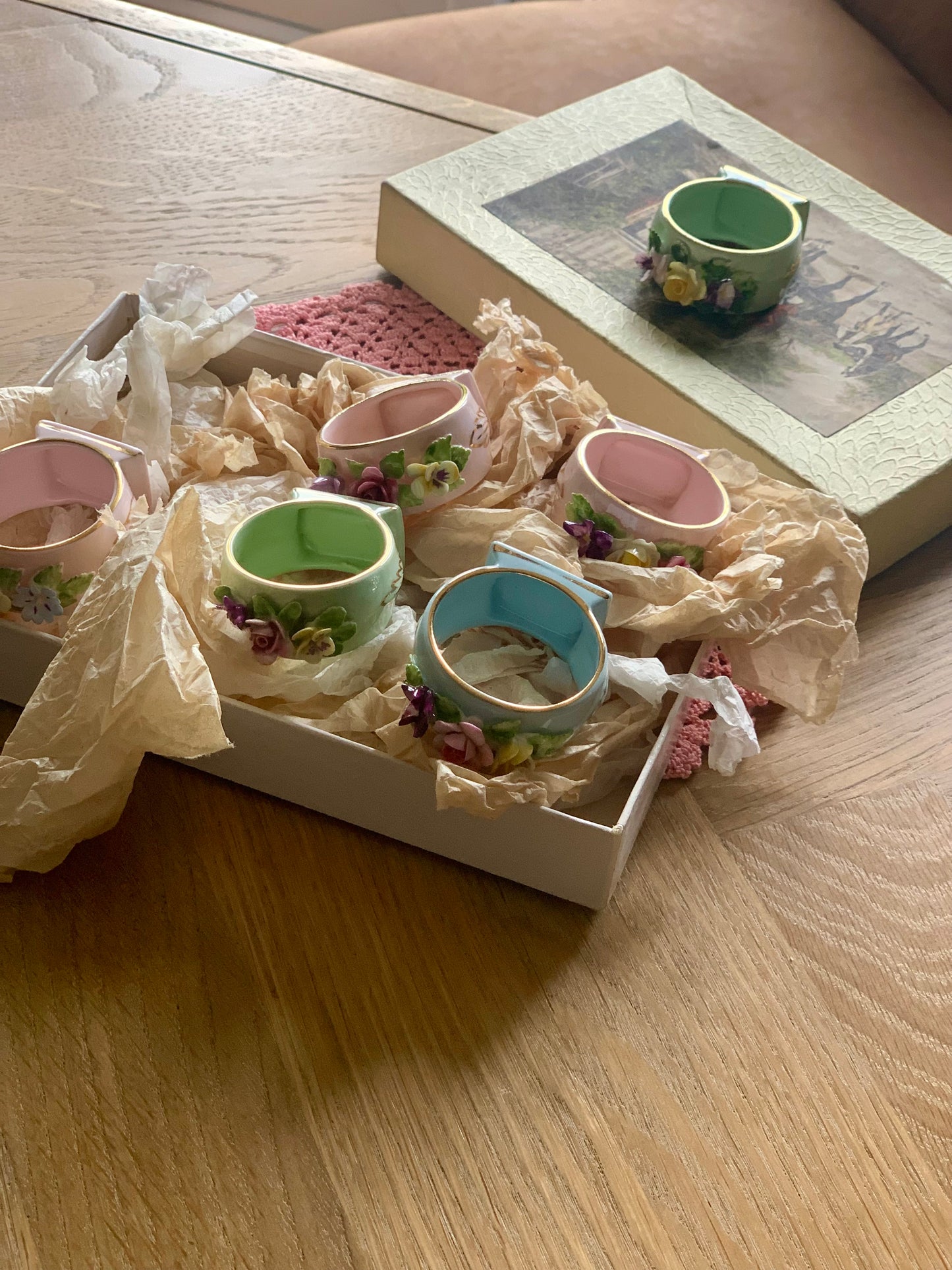 Antique, last century fine bone china, floral napkin rings.