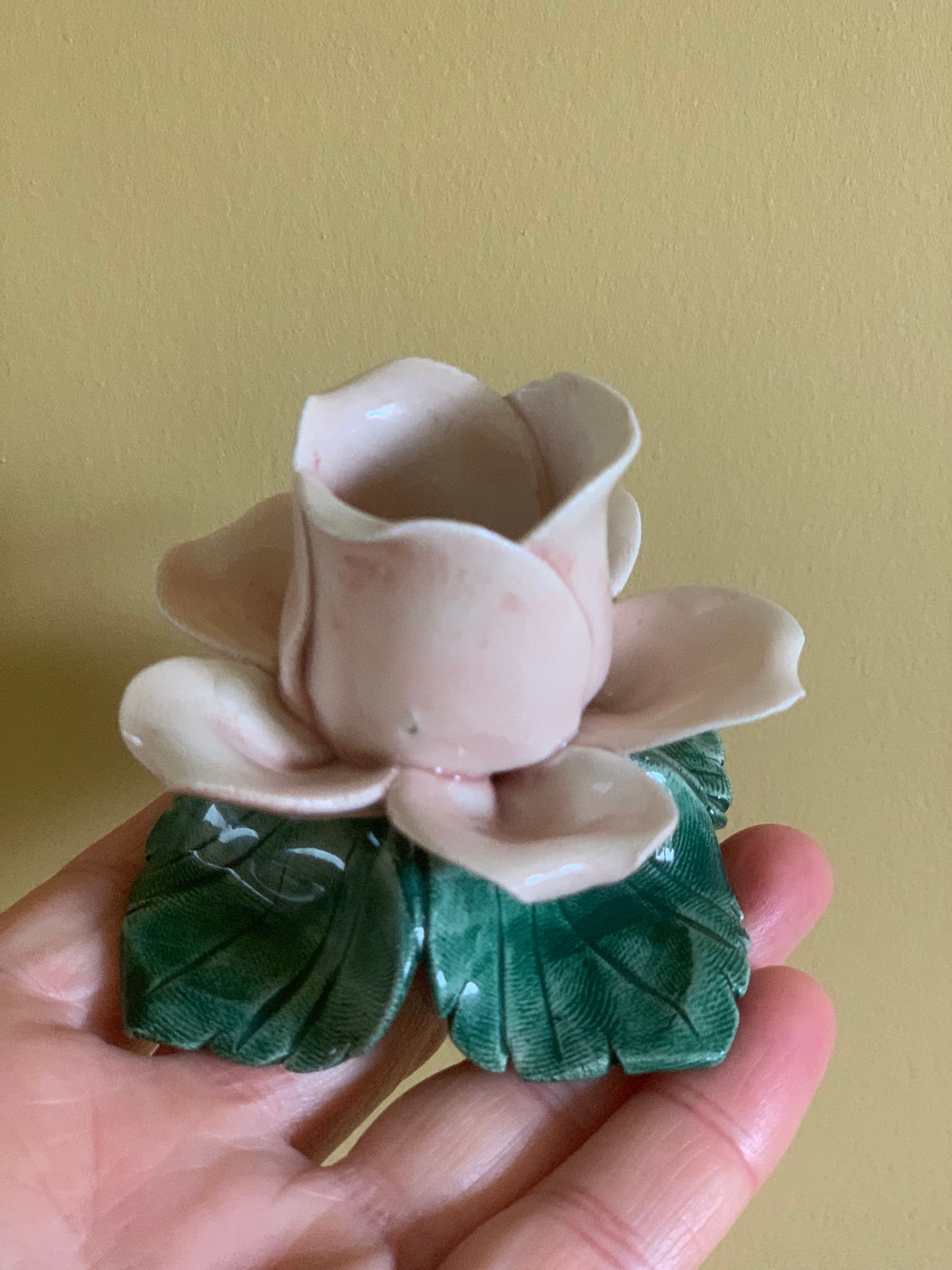 Beautiful, hand made ceramic rose candlestick holders.