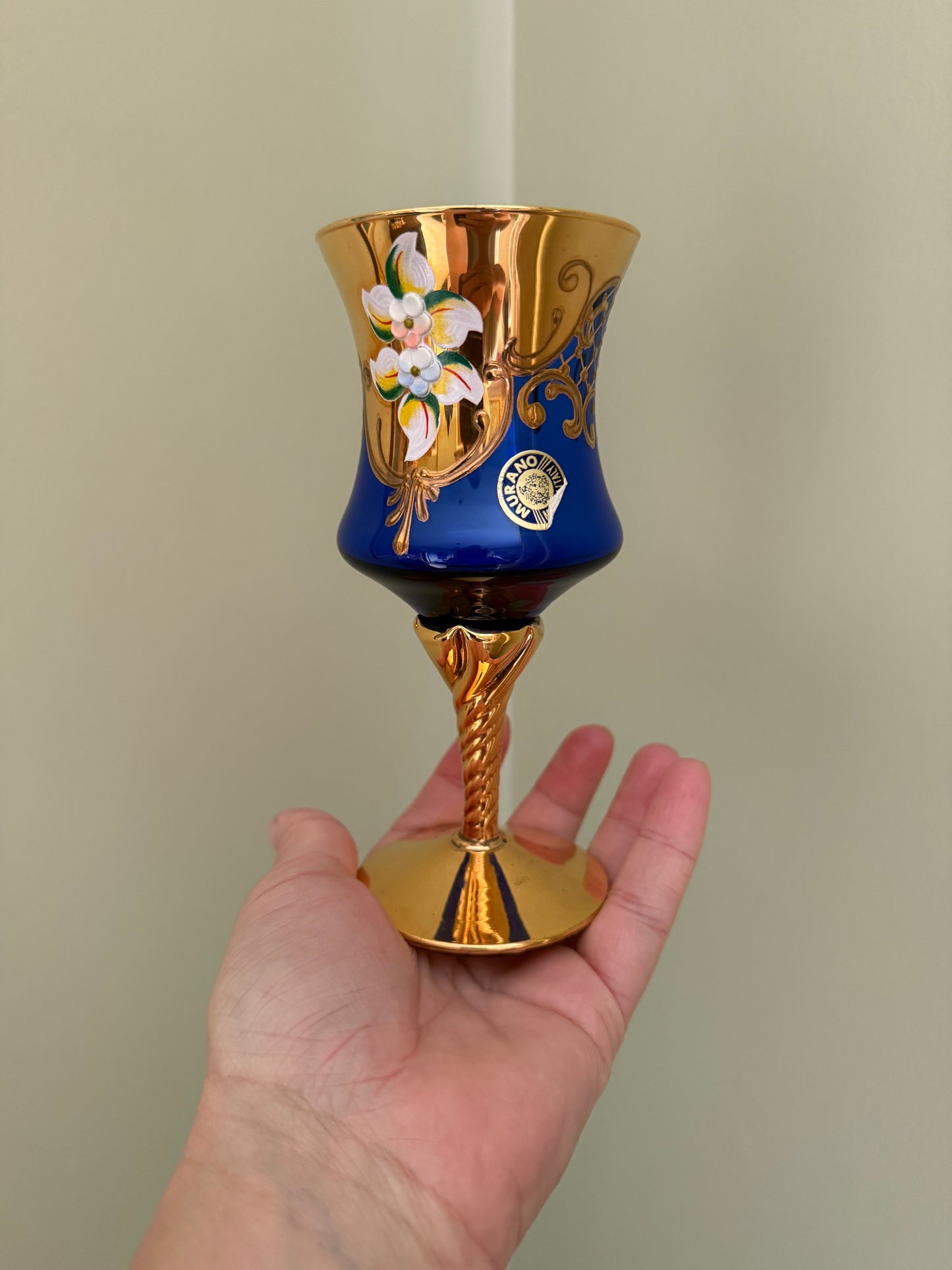 Set of 4 Murano cobalt blue and gold Venetian glass goblets with enamel floral decoration.