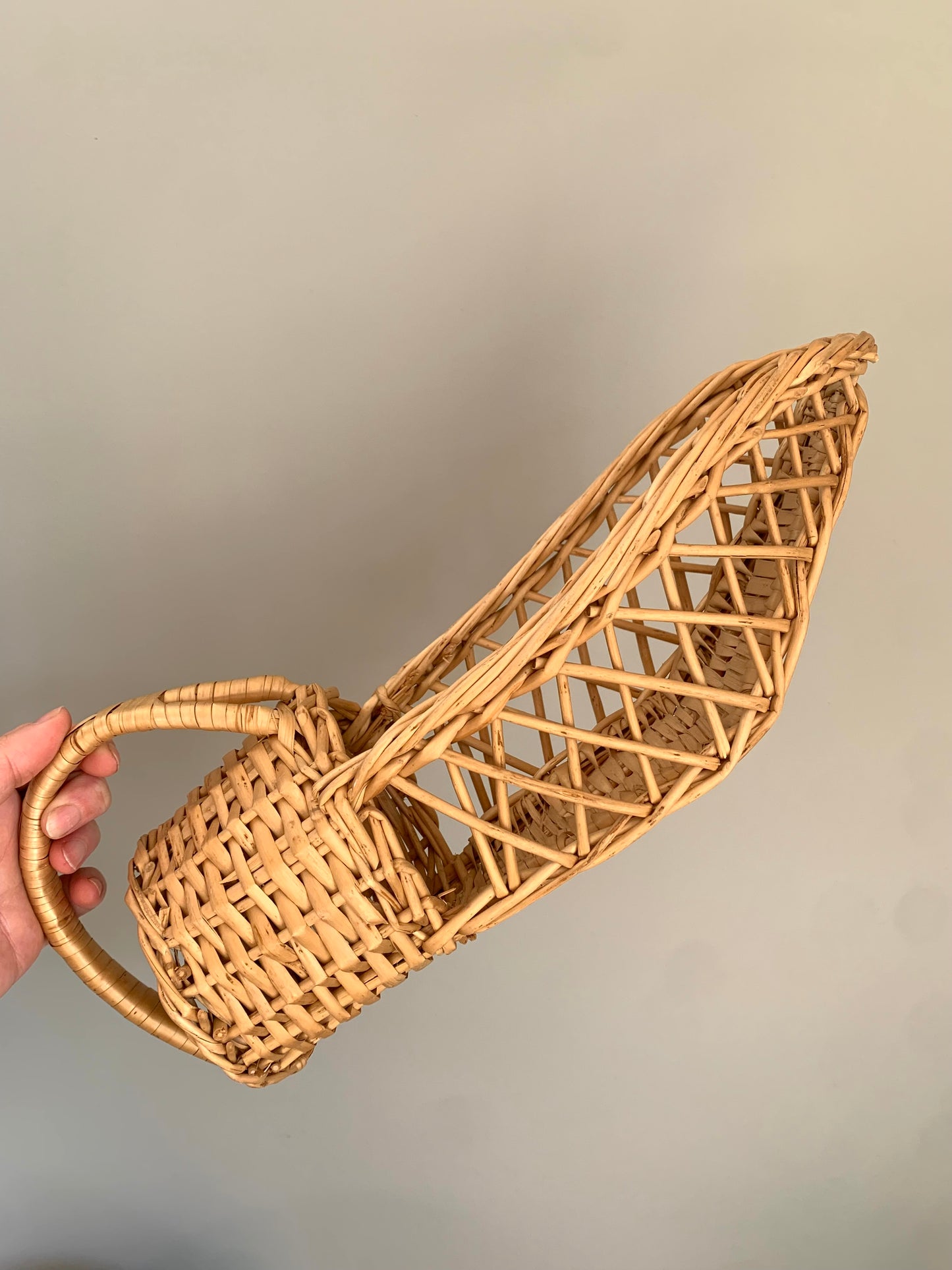 Vintage, hand made wicker wine basket.